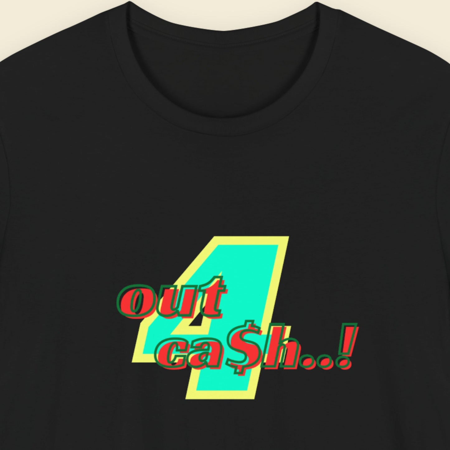 Black t-shirt with multicolored 'out 4 ca$h..!' text on a beige background.