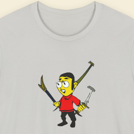 Light grey tee with a fun, colorful cartoon illustration on a beige background.