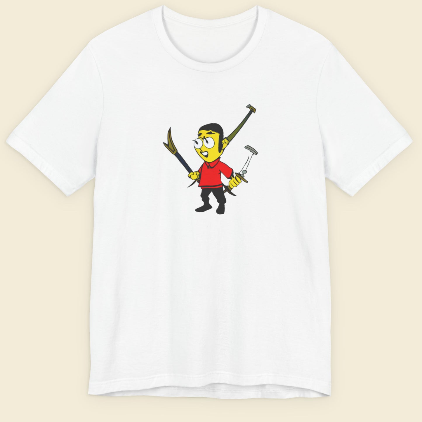 White tee with a fun, colorful cartoon illustration on a beige background.