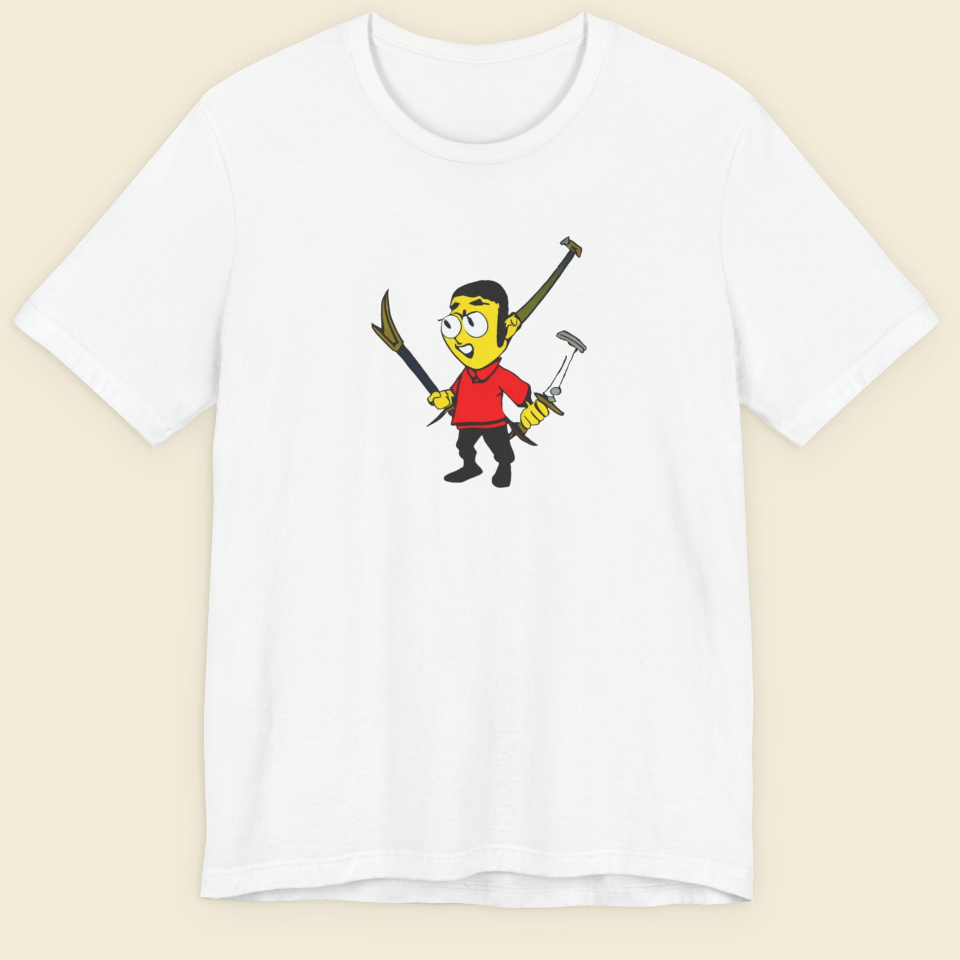 White tee with a fun, colorful cartoon illustration on a beige background.