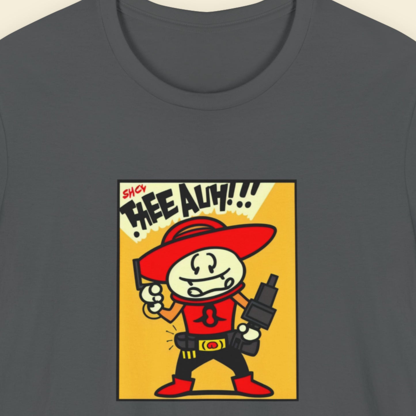 T-shirt with a cartoon character and text on a gray background.