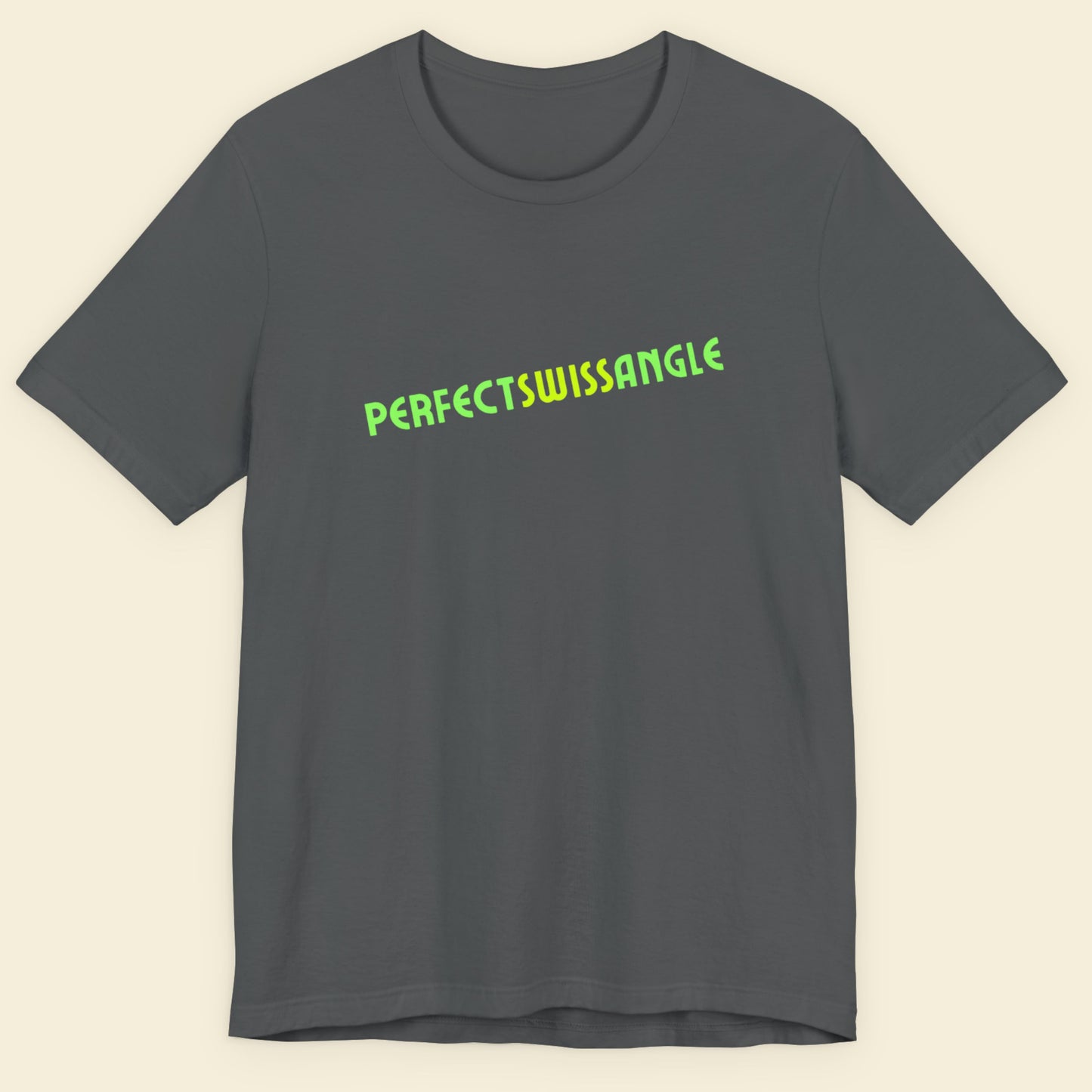 Gray t-shirt with green text 'PERFECTSWISSANGLE' on a beige background.
