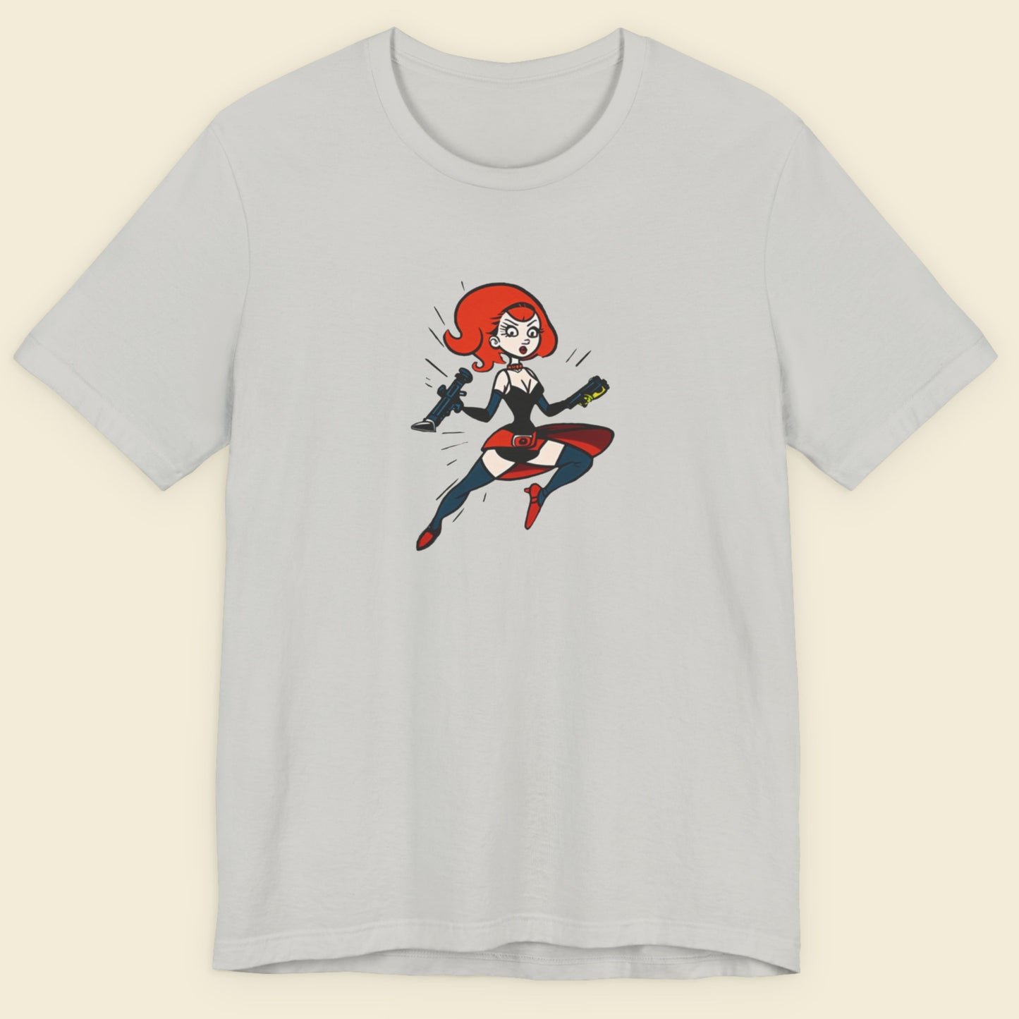 Light grey t-shirt with a fun, colorful cartoon hero illustration on a beige background.