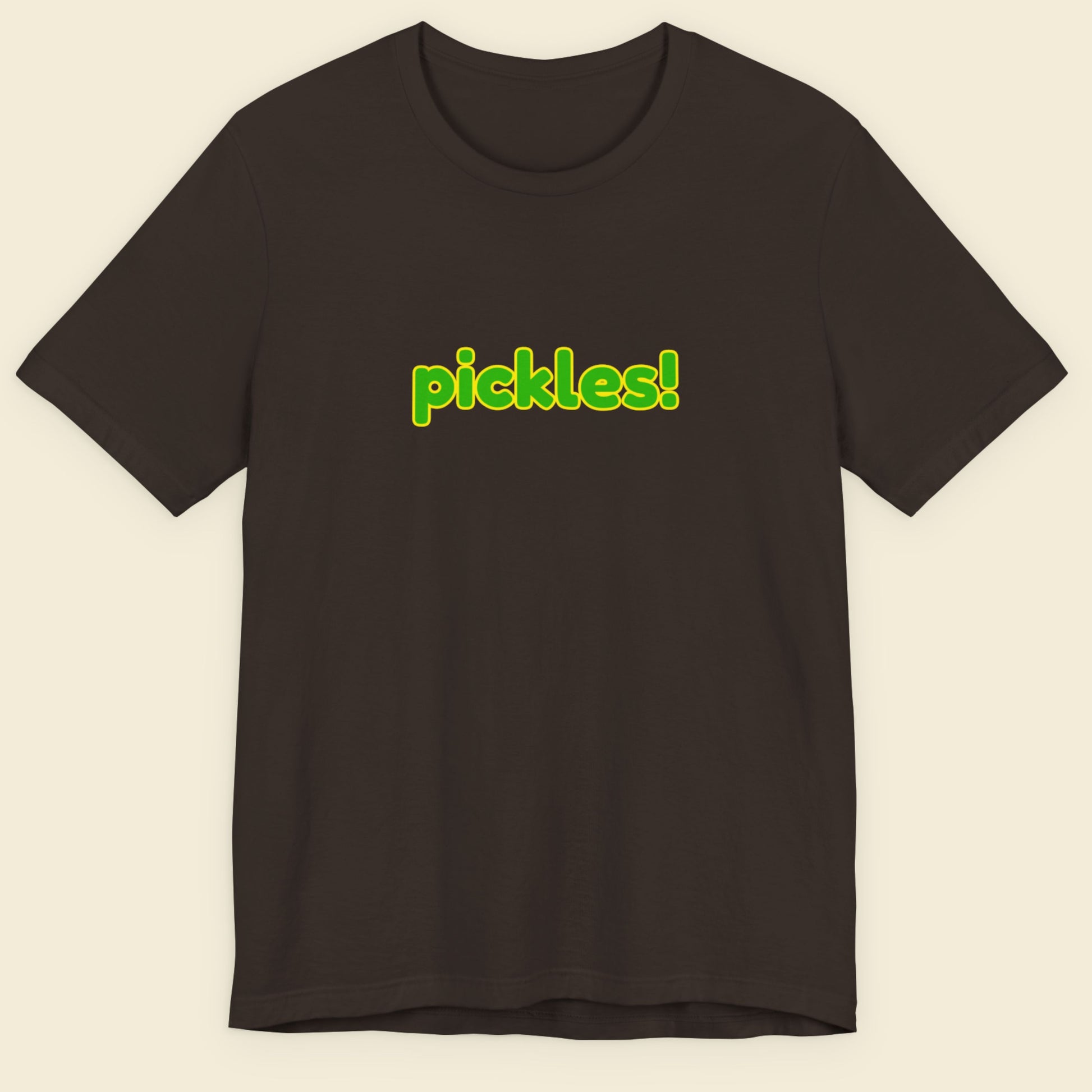 Brown t-shirt with humorous colorful pickles! text on a beige background.