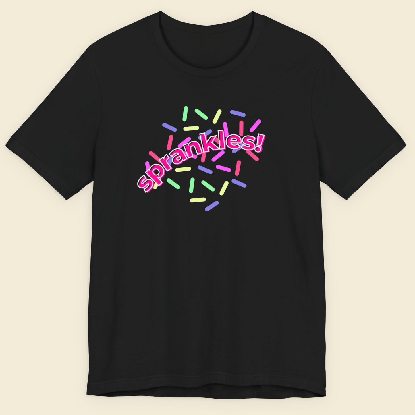 Black t-shirt with humorous colorful text on a beige background.