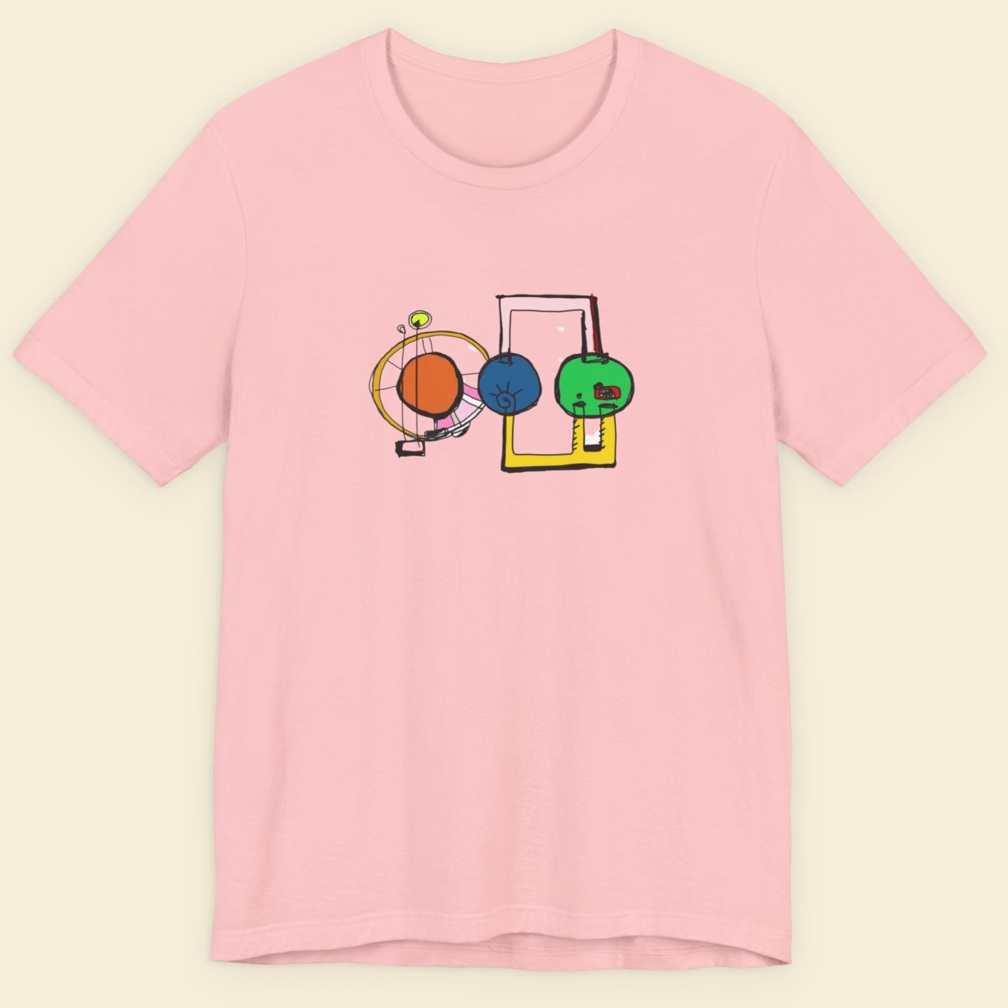 Pink t-shirt with colorful graphic design on a beige background.