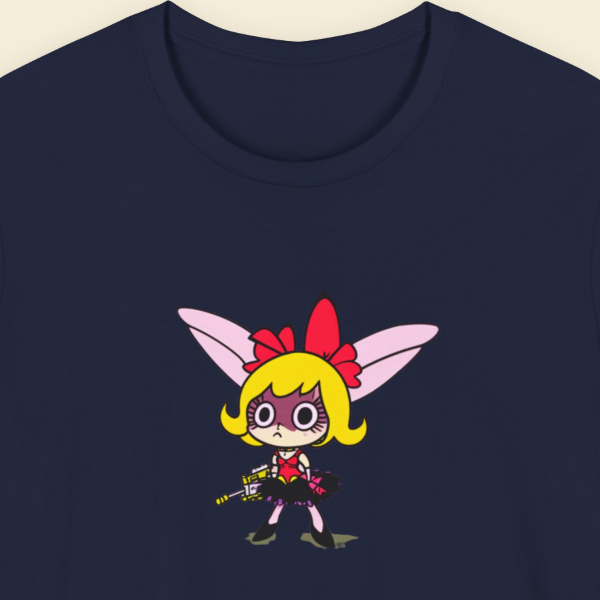 Navy blue t-shirt with a fun, colorful cartoon illustration on a beige background.
