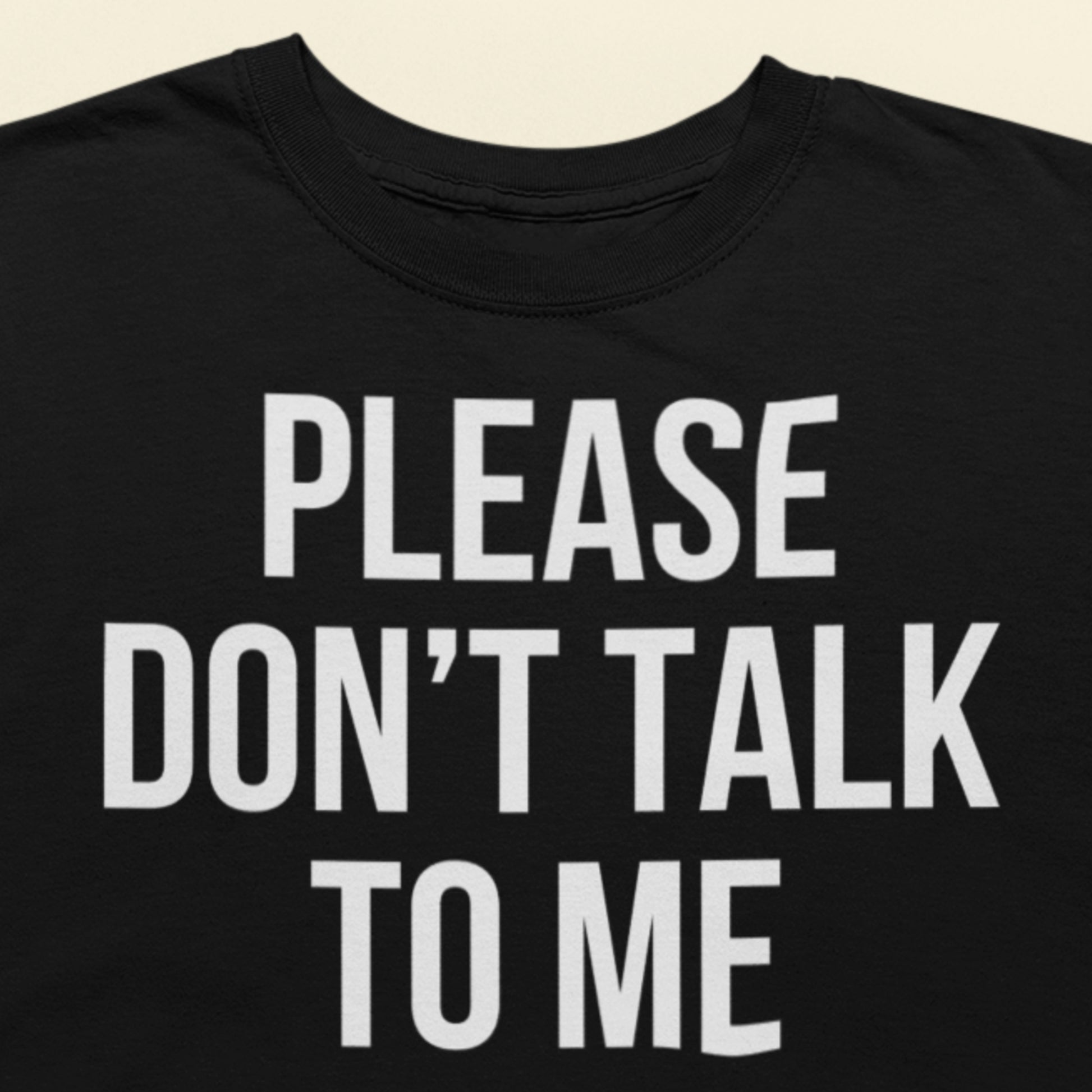 Please don't talk to me text t-shirt black minimalist design closeup