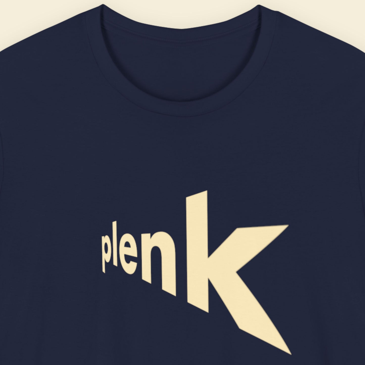 Navy blue t-shirt with humorous nonsense text on a beige background.