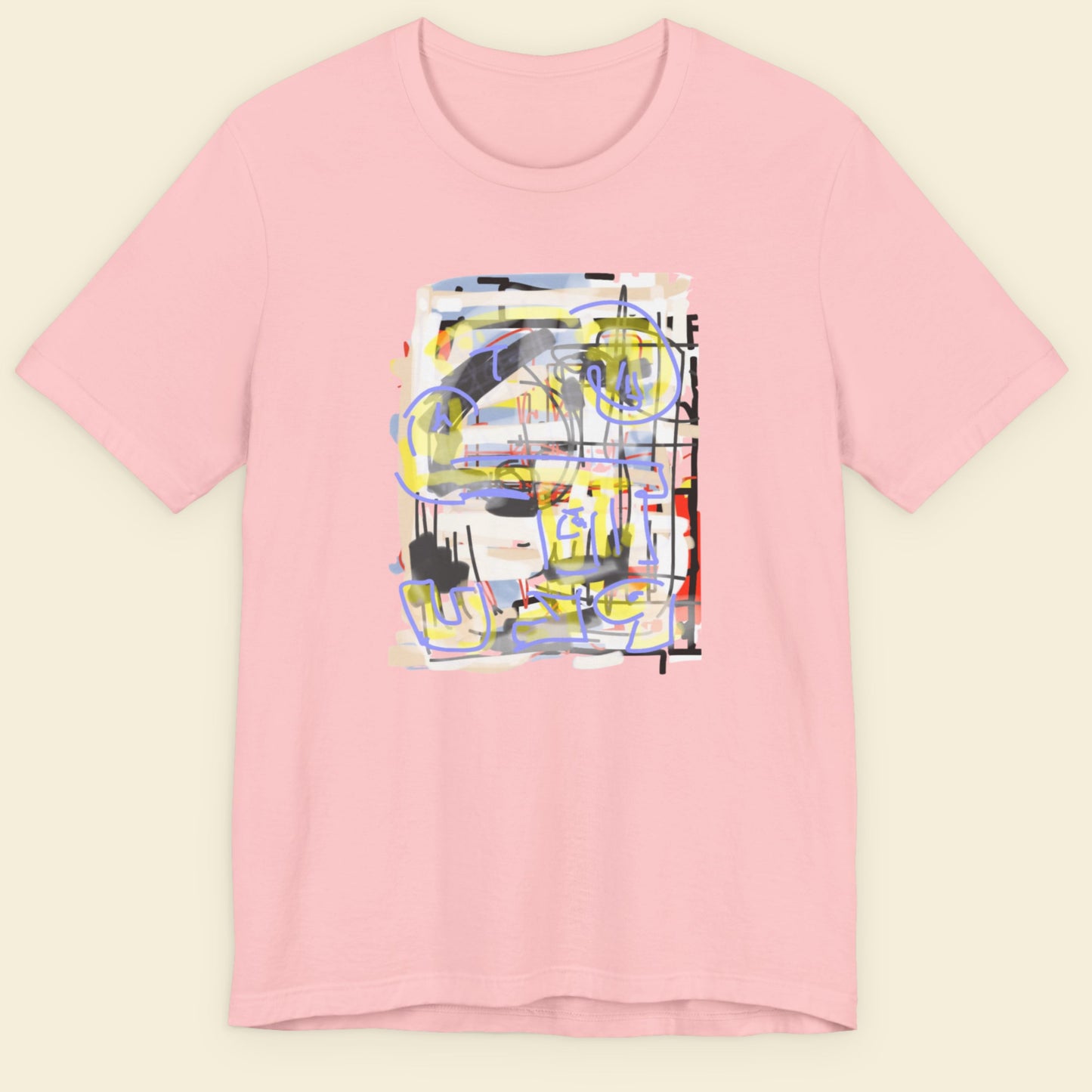 Pink t-shirt with abstract colorful design on a beige background.
