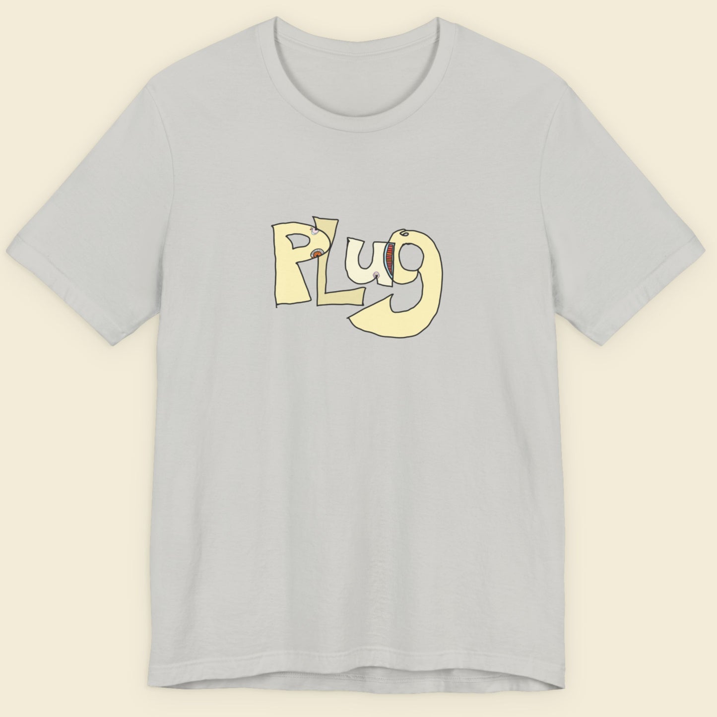 Light grey blue t-shirt with a colorful abstract graffiti drawing on a beige background.