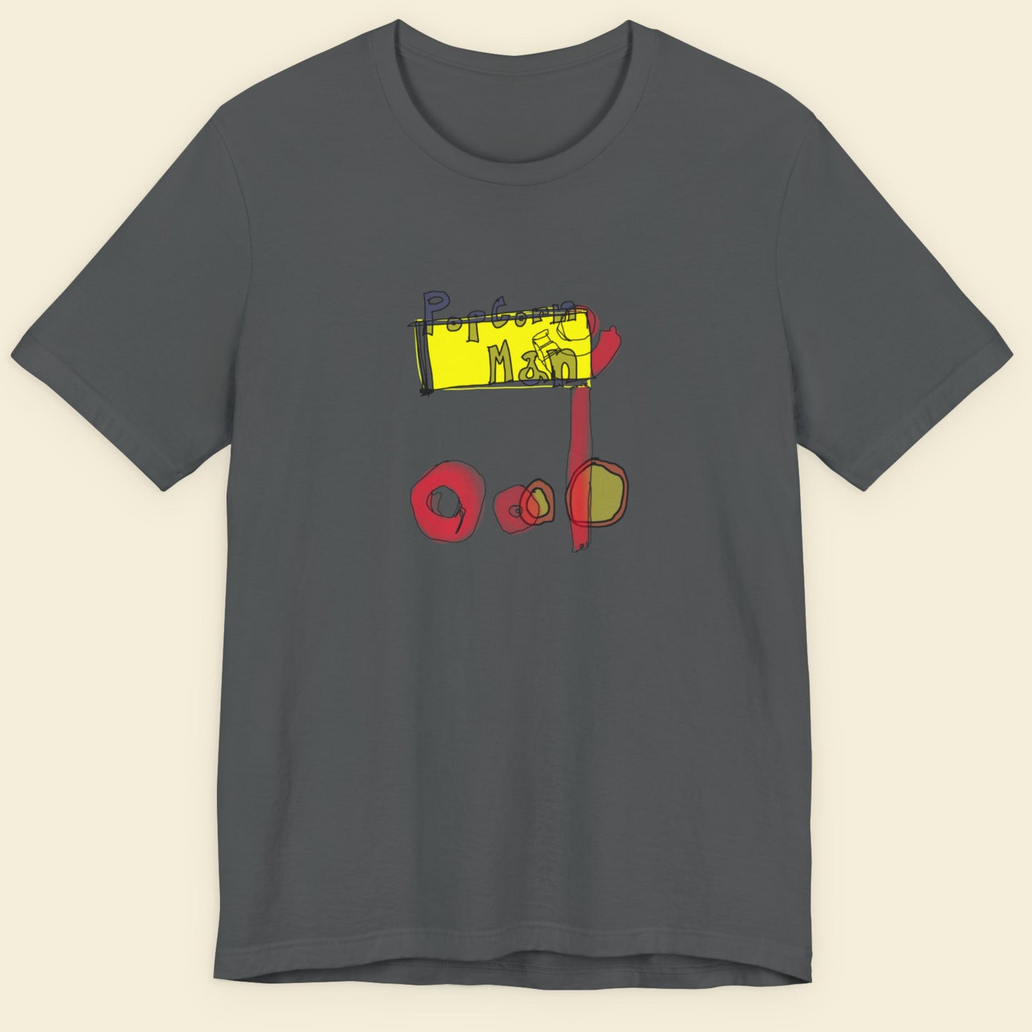 Grey t-shirt with a colorful abstract graffiti style drawing on a beige background.