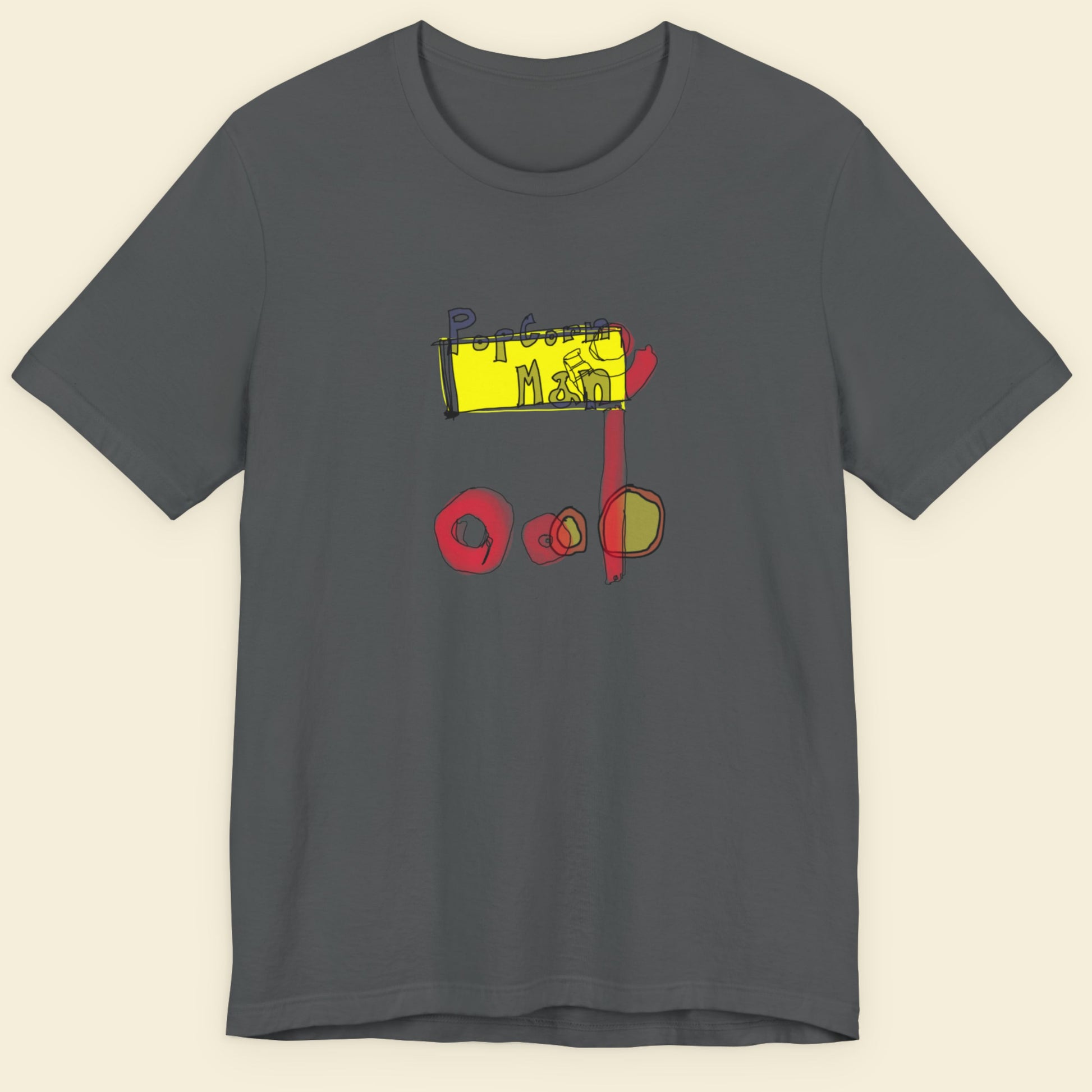 Grey t-shirt with a colorful abstract graffiti style drawing on a beige background.