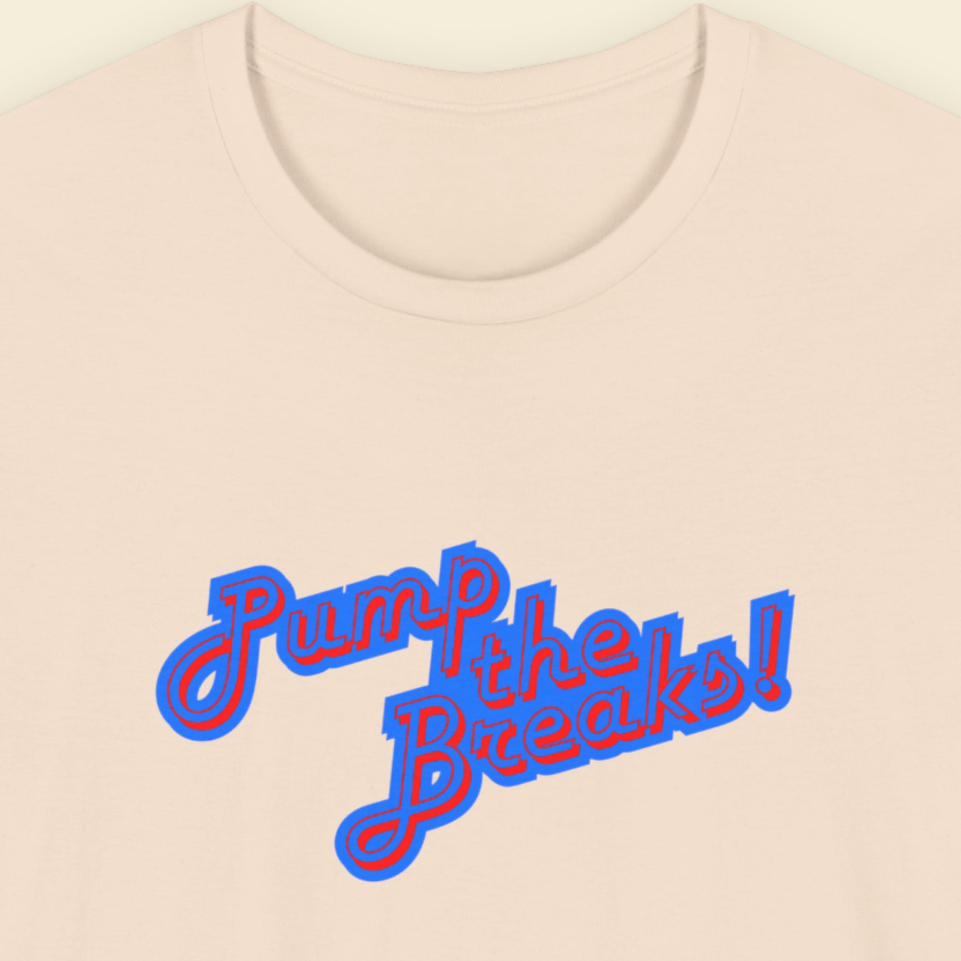 Beige t-shirt with humorous colorful text on a beige background.