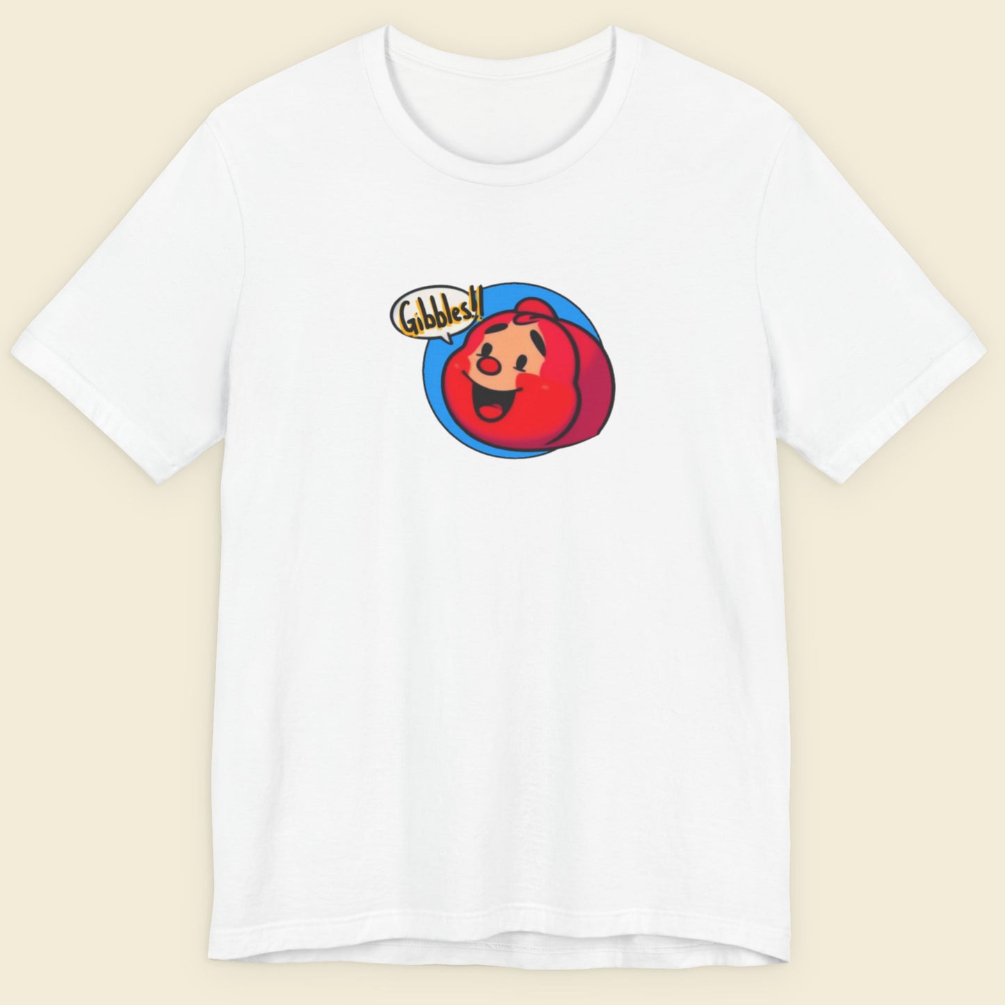 White t-shirt with a fun, colorful cartoon character illustration on a beige background.