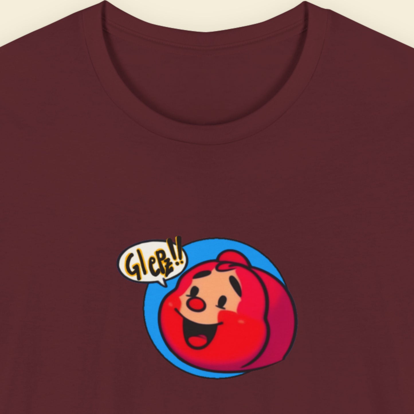 Maroon t-shirt with a fun, colorful Red Head cartoon illustration on a beige background.