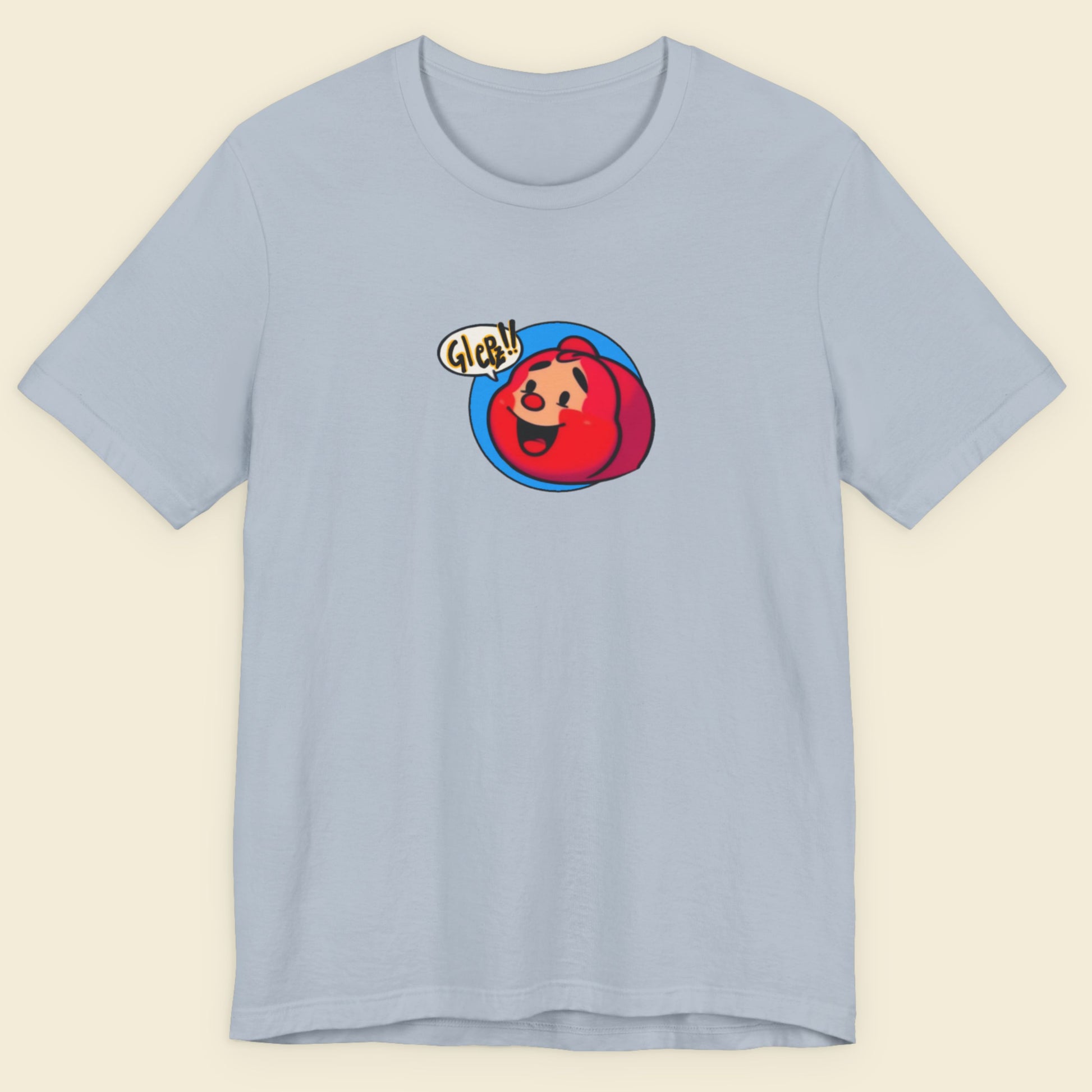 Light blue t-shirt with a fun, colorful Red Head cartoon illustration on a beige background.