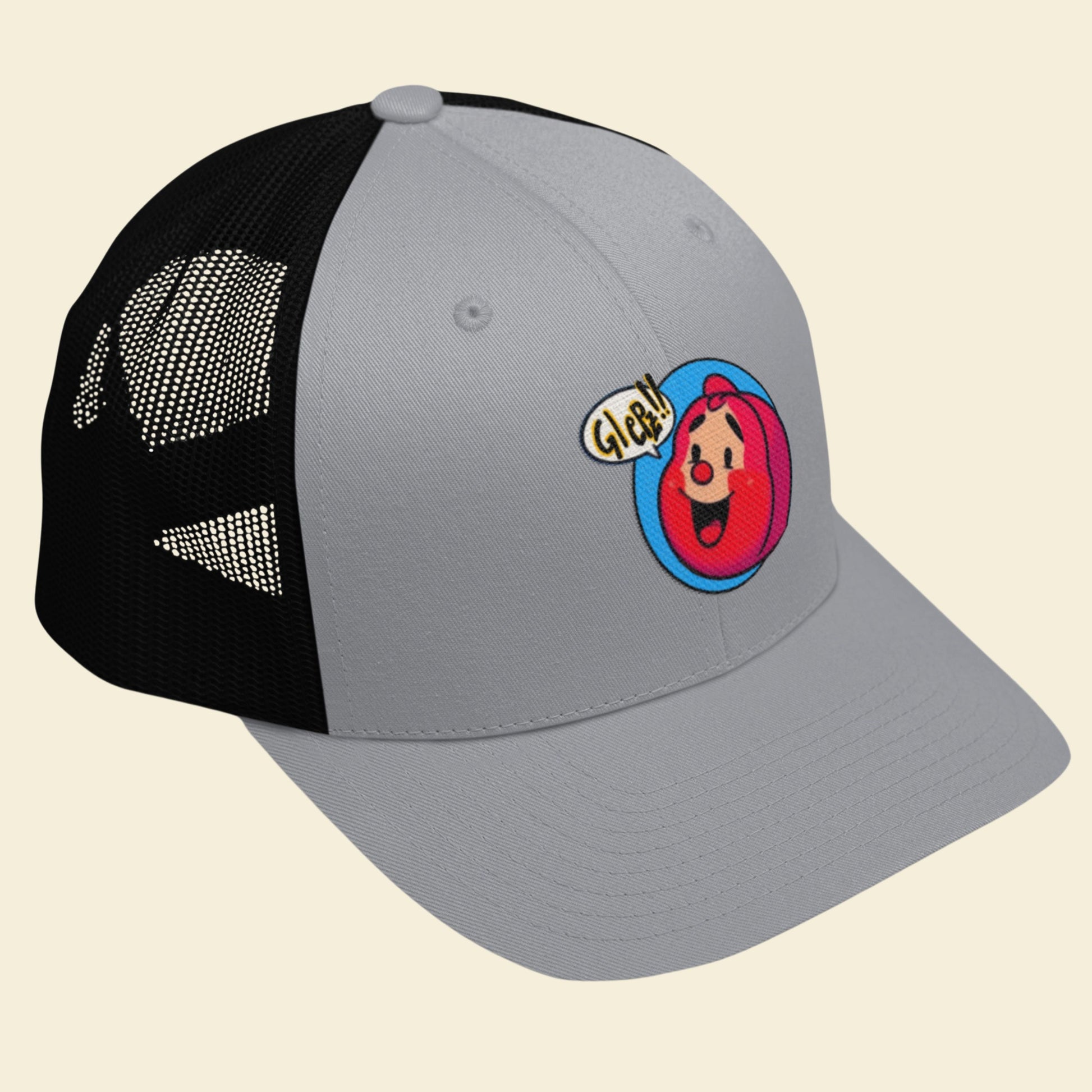 Gray and black cap with a colorful logo on a beige background.