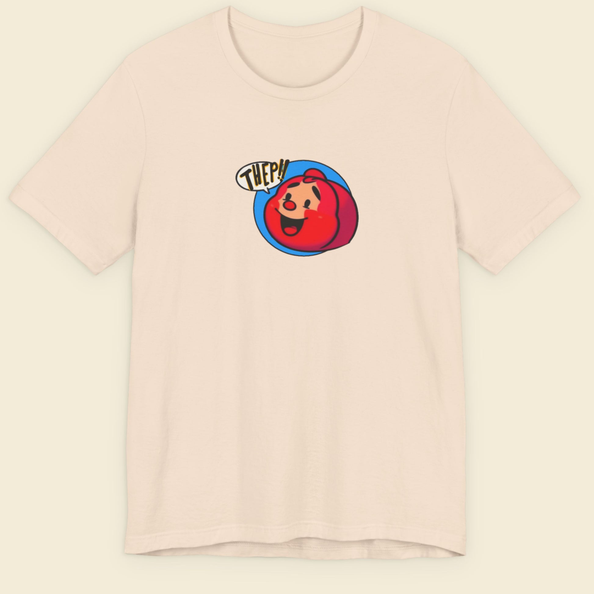 Beige t-shirt with a fun, colorful RedHead cartoon illustration on a beige background.