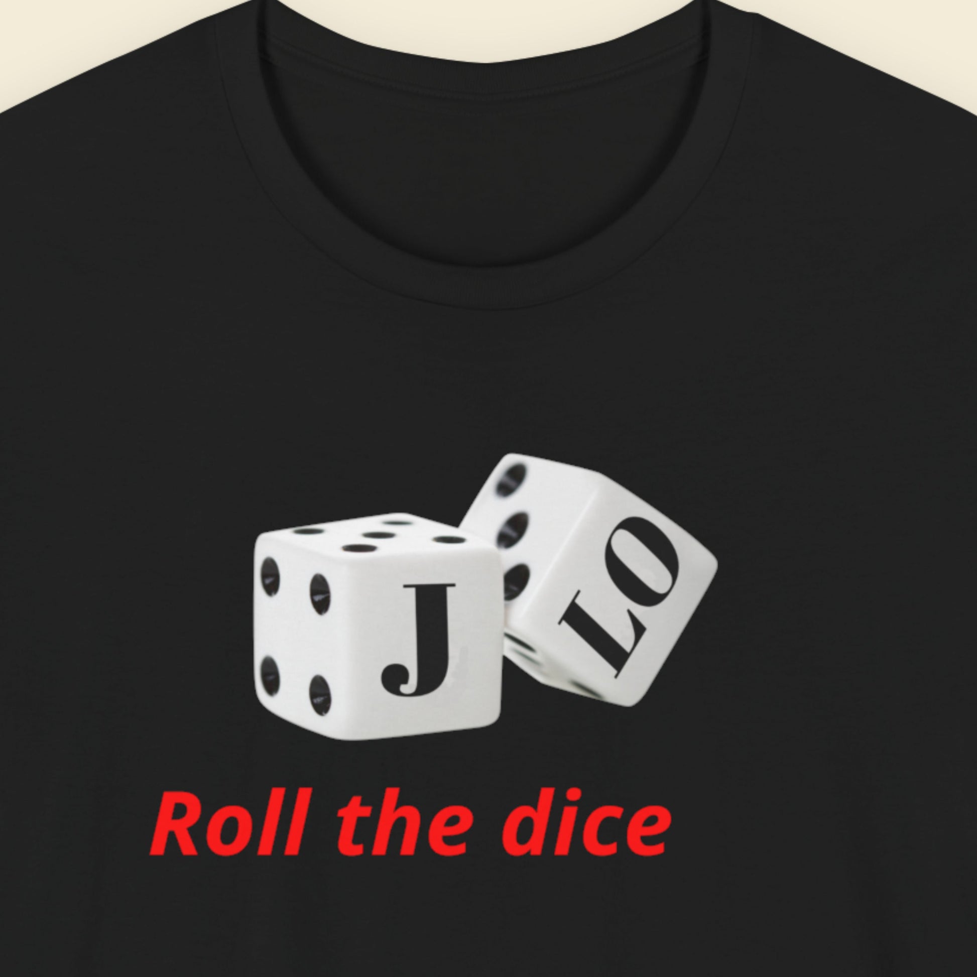 Black t-shirt with dice design and 'Roll the dice' text on a beige background.