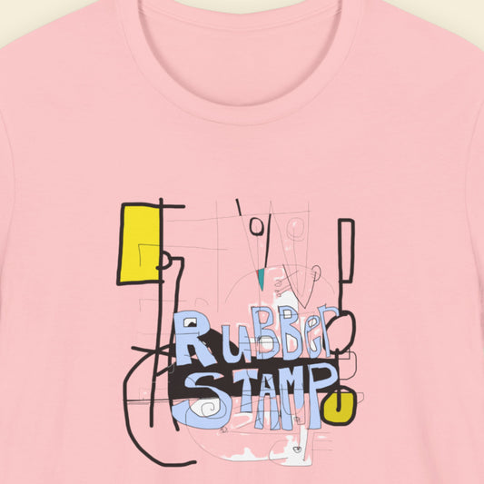 Pink t-shirt with a colorful abstract drawing on a beige background.