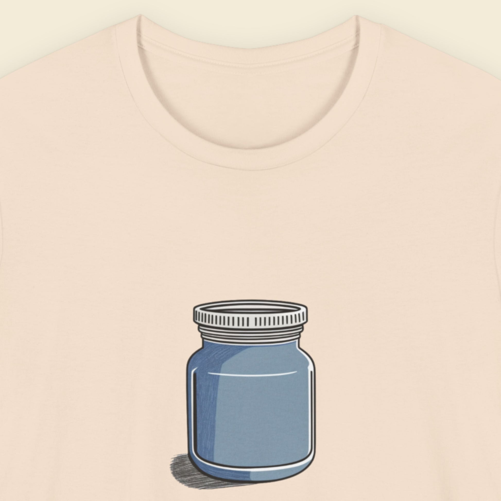 Beige shirt with a sketch of a blue jar on a beige background.