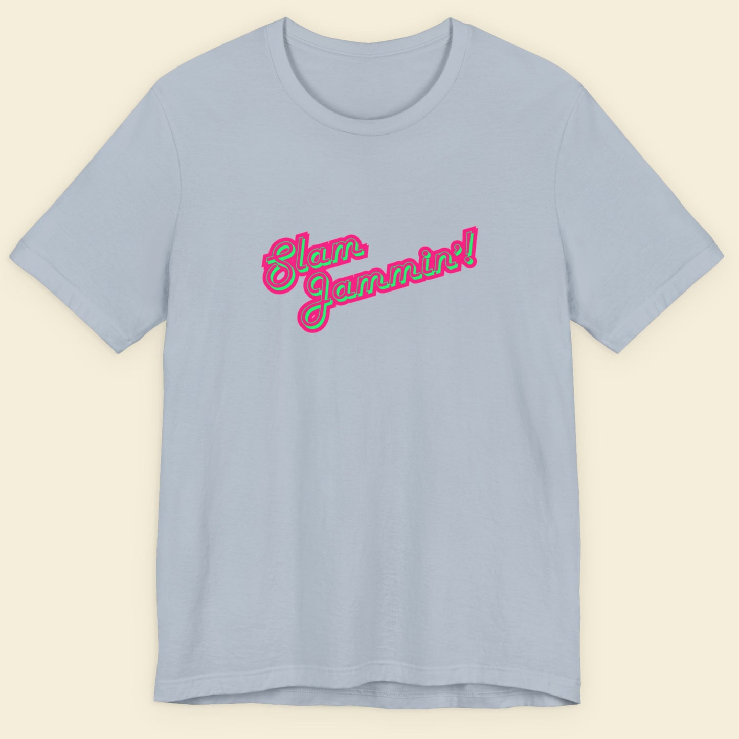 Light blue tee with multi-colored humorous text on a beige background.