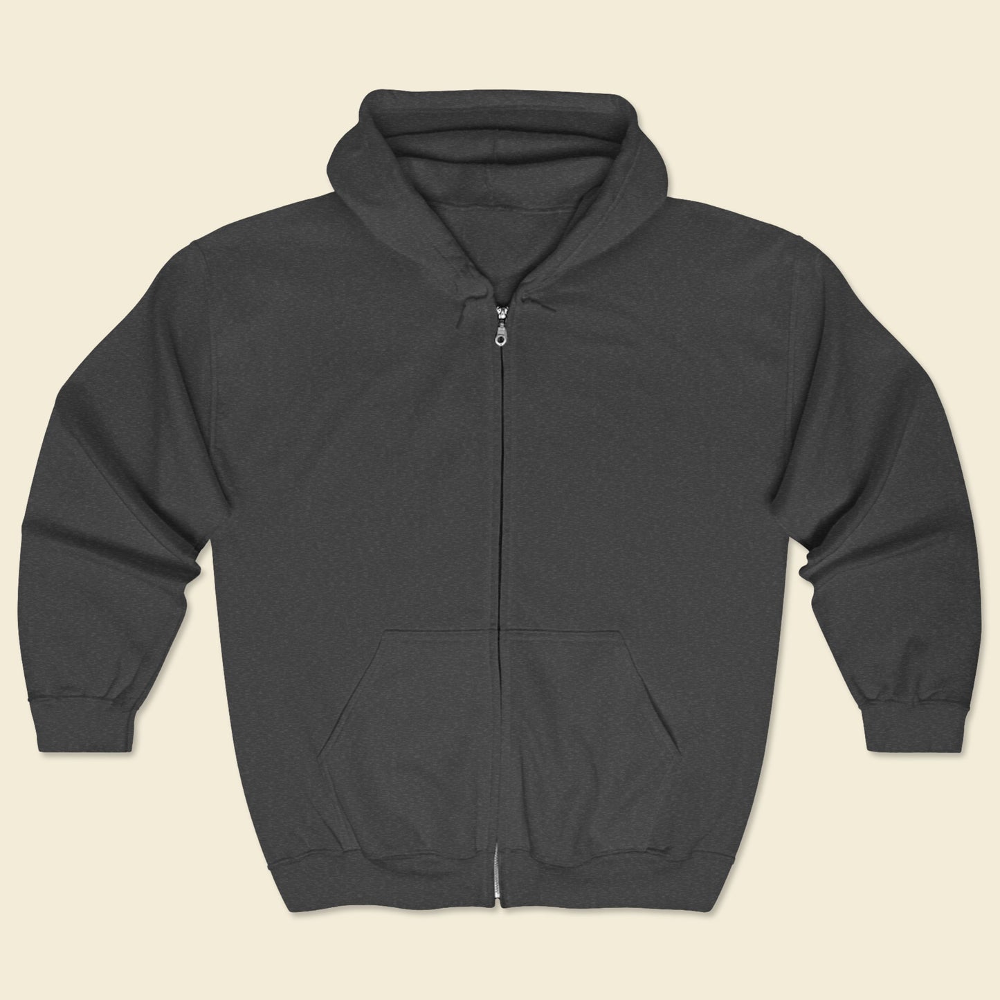 Dark gray hoodie with a zipper on a beige background.