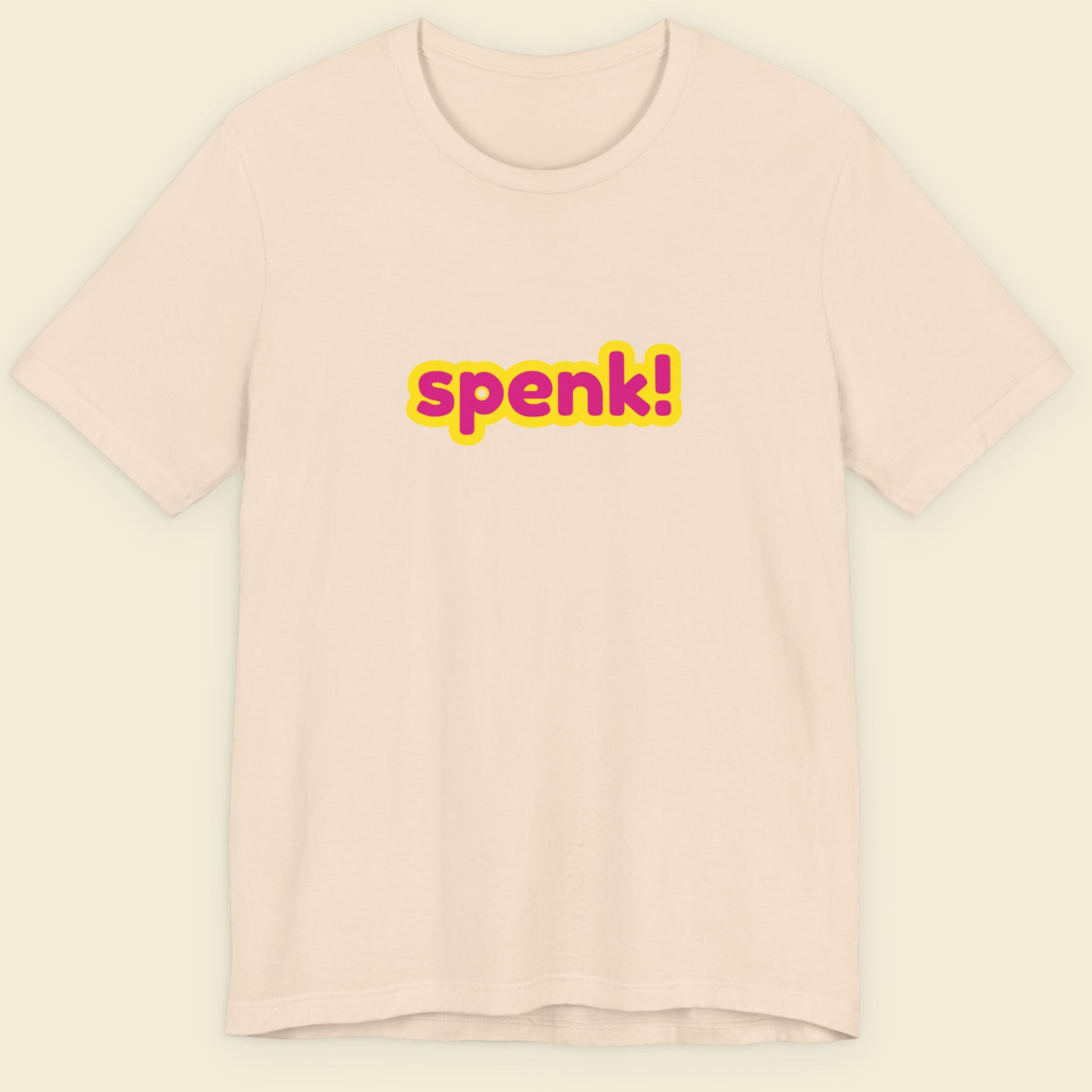 Beige t-shirt with multicolored 'spenk!' text on a beige background.