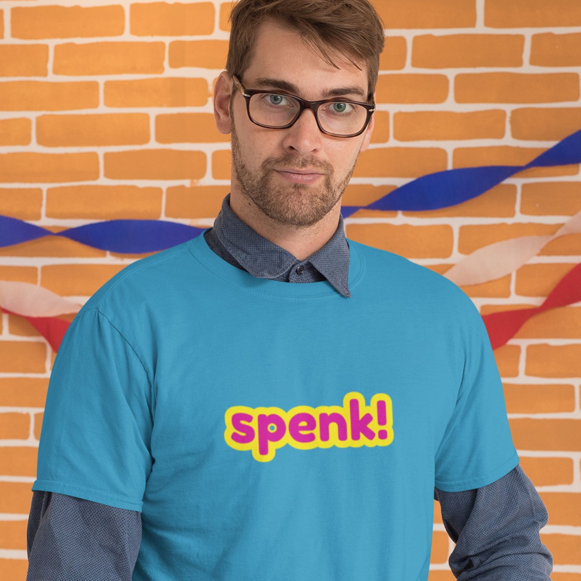 Your high school science teacher wearing an aqua blue t-shirt with multicolored 'spenk!' text in the teacher's lounge.