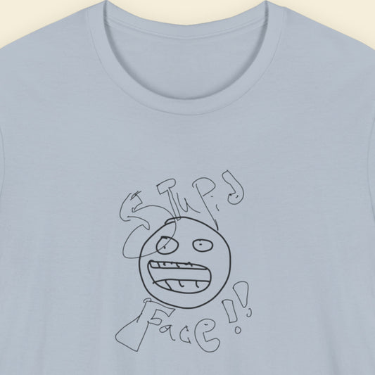 light blue t-shirt with a line drawing and the words 'stupid face' written on it