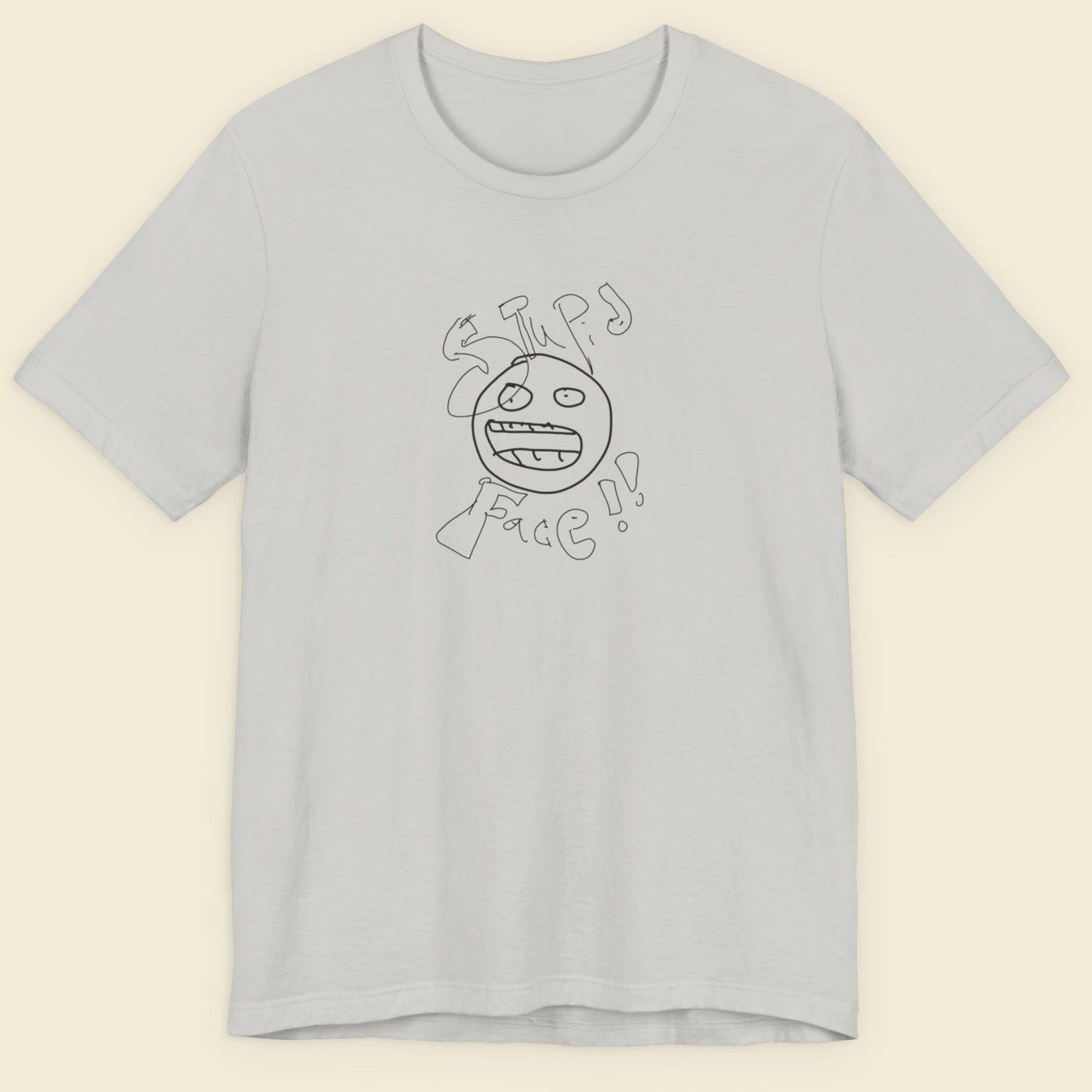 light grey t-shirt with a line drawing and the words 'stupid face' written on it