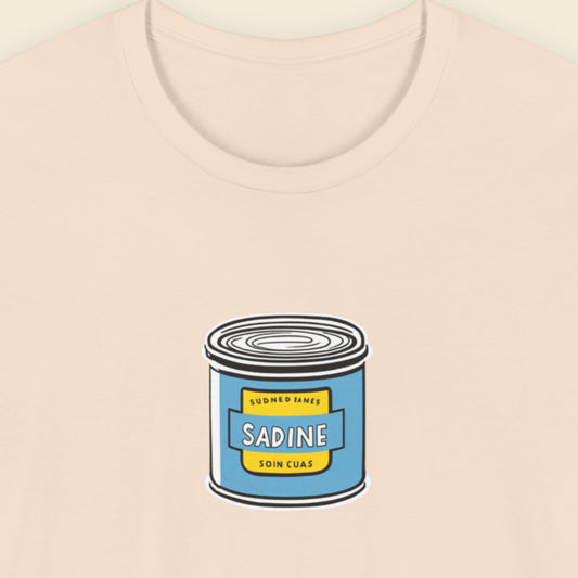 beige shirt with an illustration of a can of fish on a beige background.
