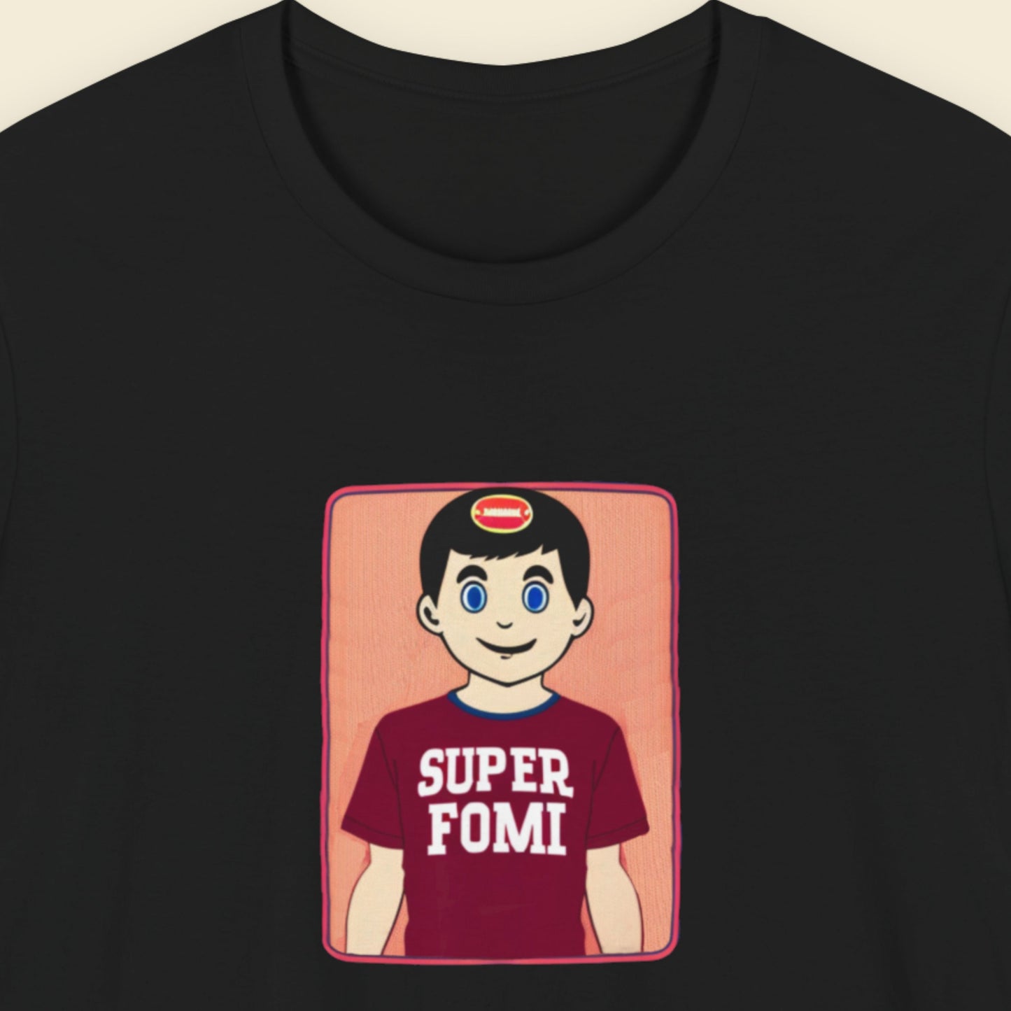 Black shirt with a fun, colorful cartoon illustration on a beige background.