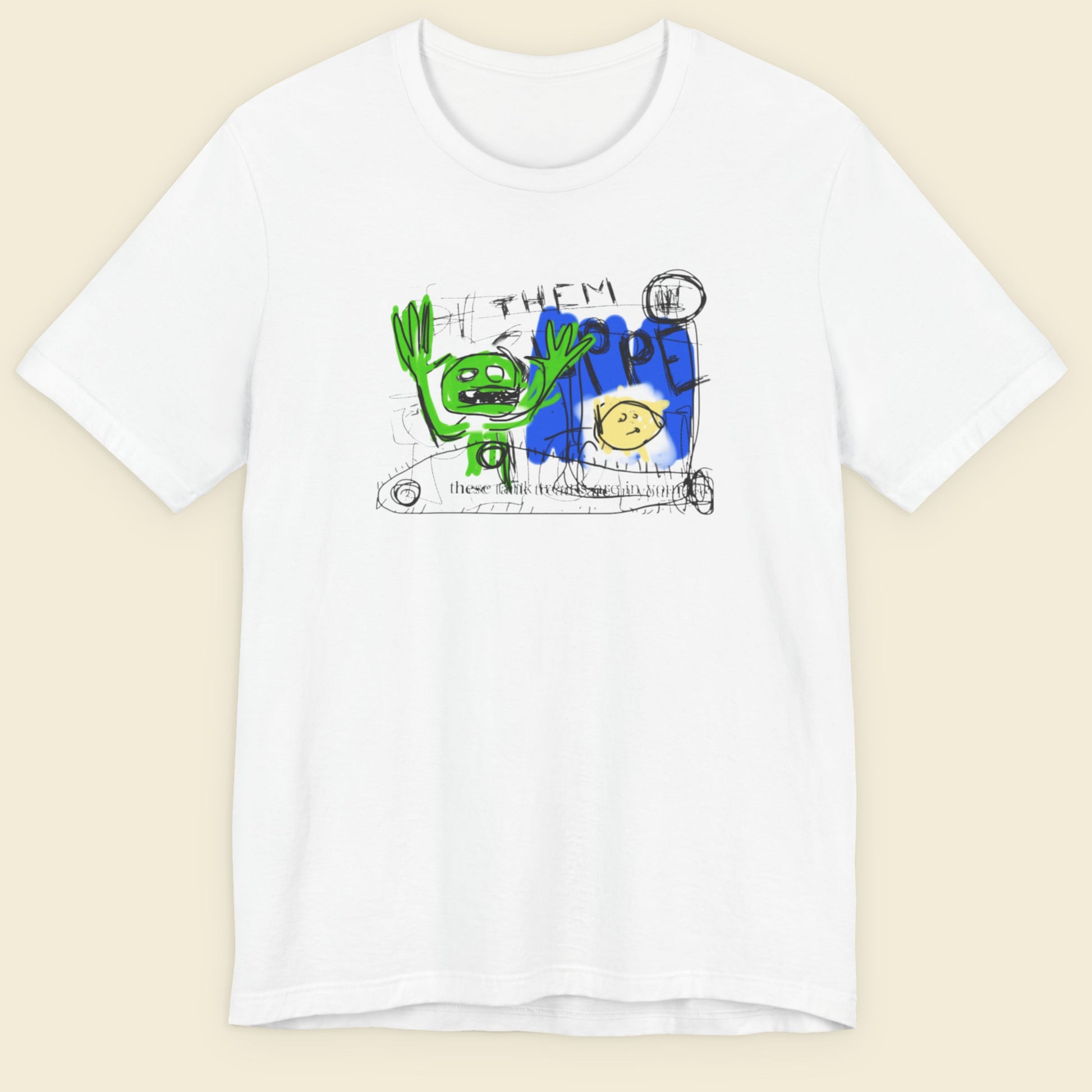White t-shirt with colorful graphic design on a beige background.