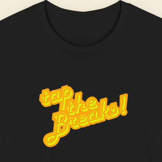 Black t-shirt with humorous colorful text on a beige background.