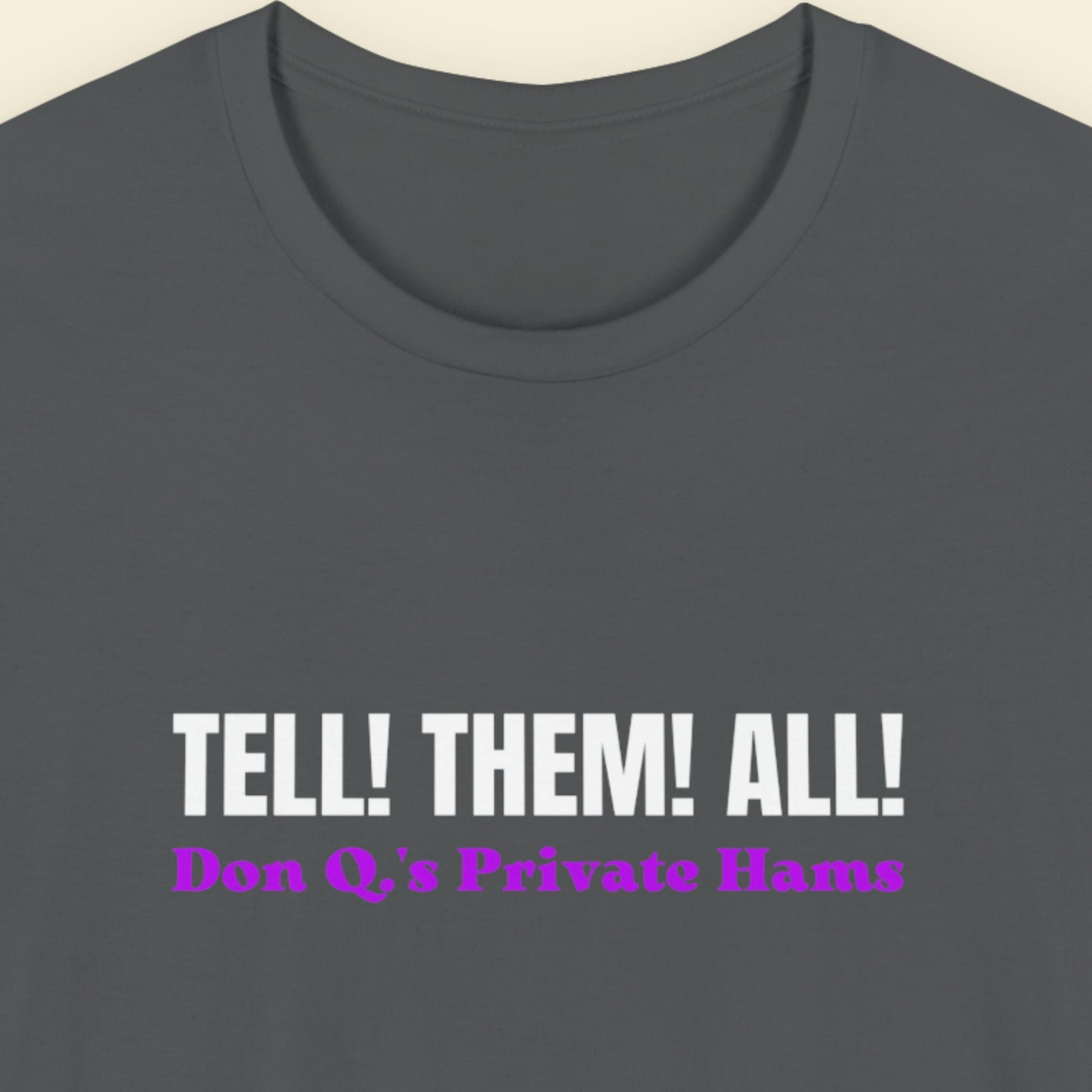 Gray t-shirt with text 'TELL! THEM! ALL! Don Q's Private Hams' on a beige background.
