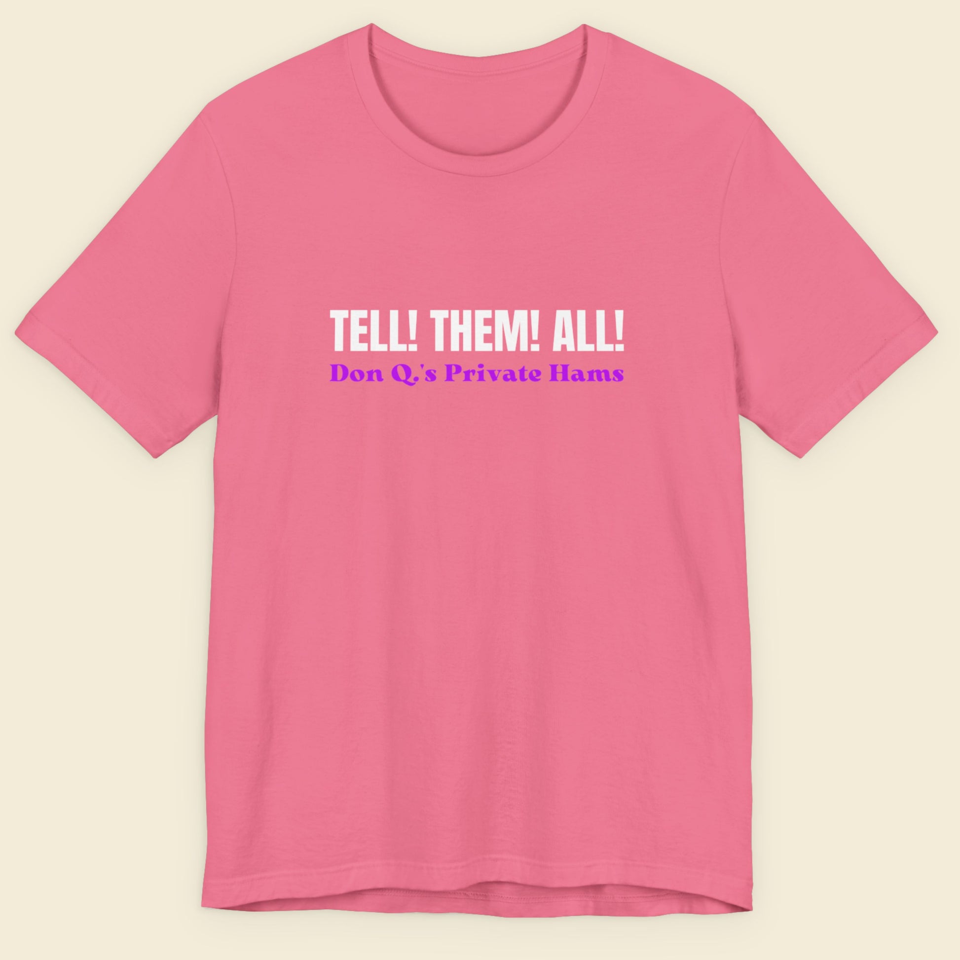 Pink t-shirt with text 'Tell! Them! All! Don Q's Private Hams' on a beige background.