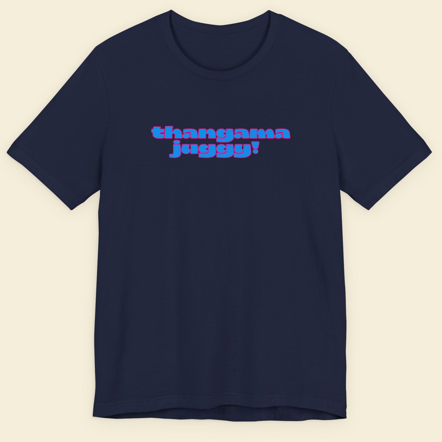 Navy blue t-shirt with humorous colorful text on a beige background.