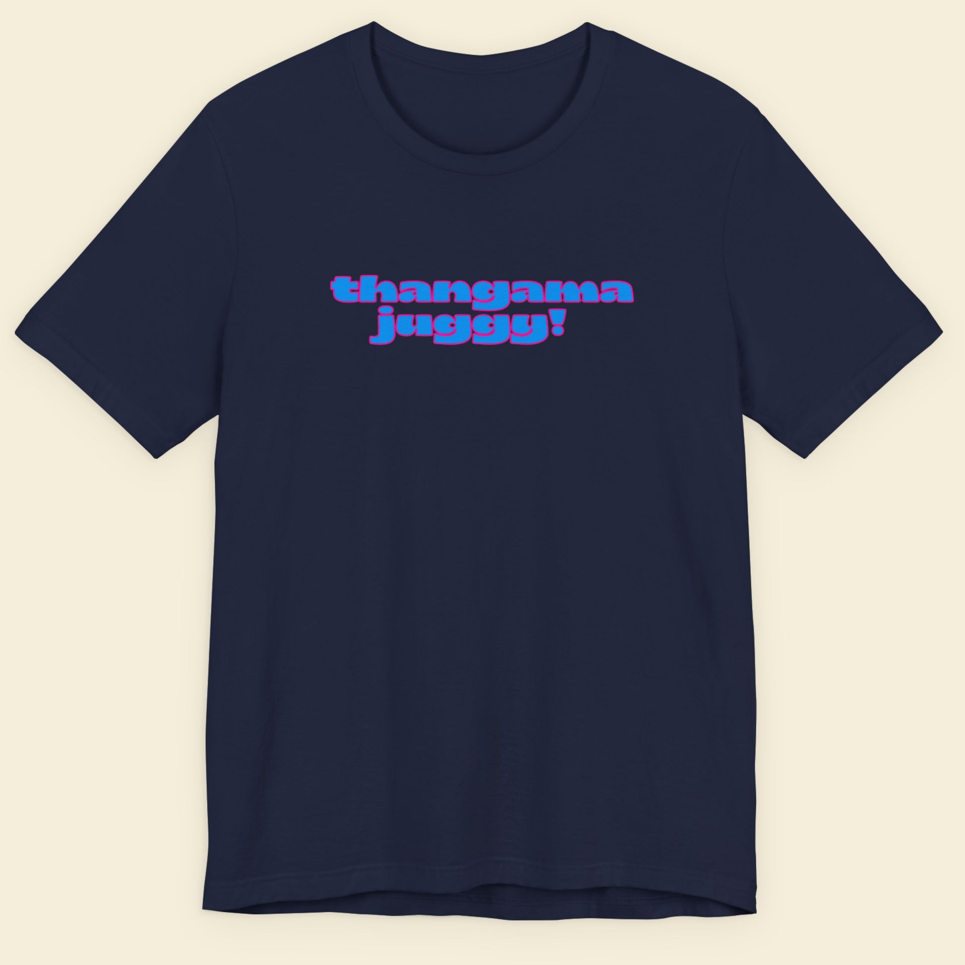 Navy blue t-shirt with humorous colorful text on a beige background.