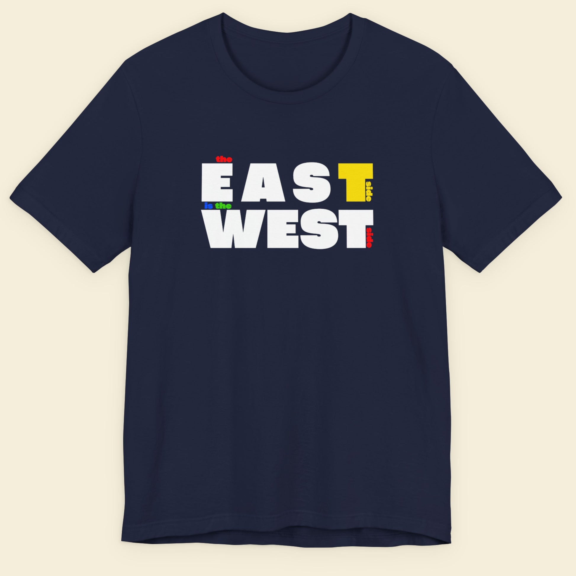 Navy blue t-shirt with multicolored 'the east side is the west side' text on a beige background.