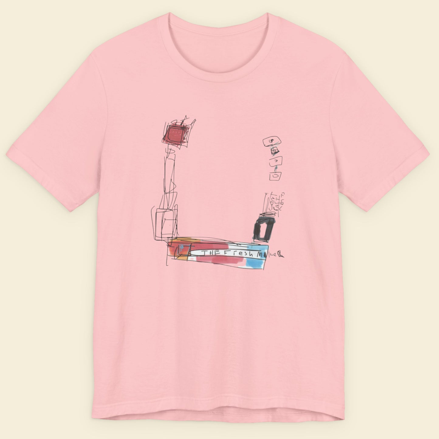 Pink t-shirt with a colorful abstract drawing on a beige background.