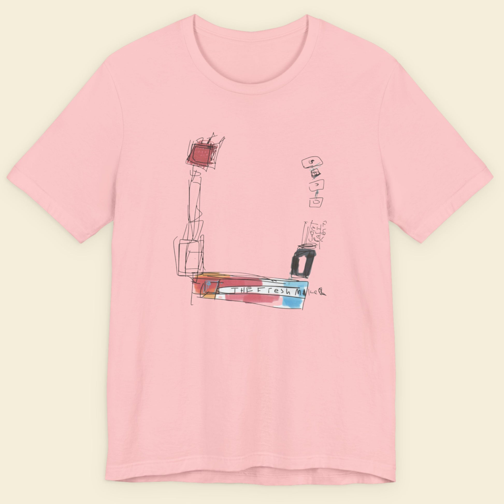 Pink t-shirt with a colorful abstract drawing on a beige background.