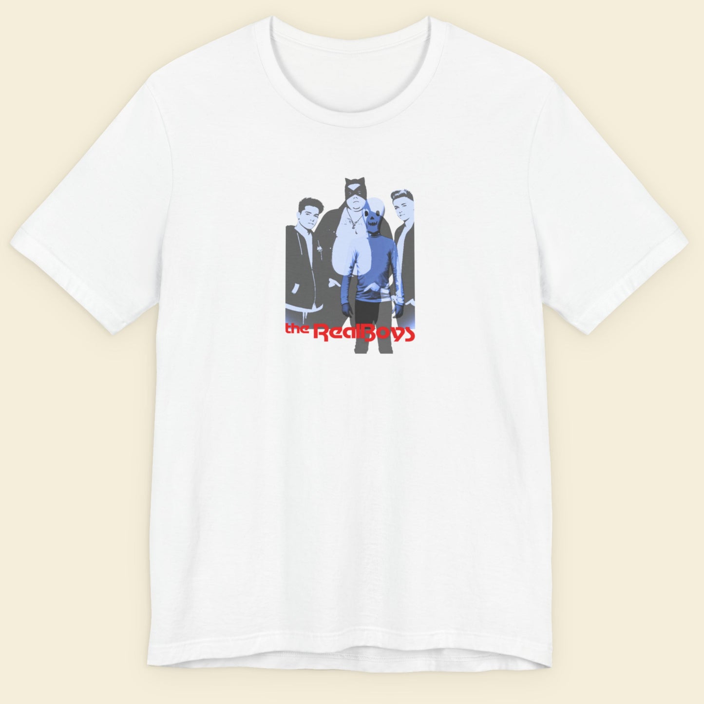 White t-shirt with graphic design and 'the RealBoys' text on a beige background.