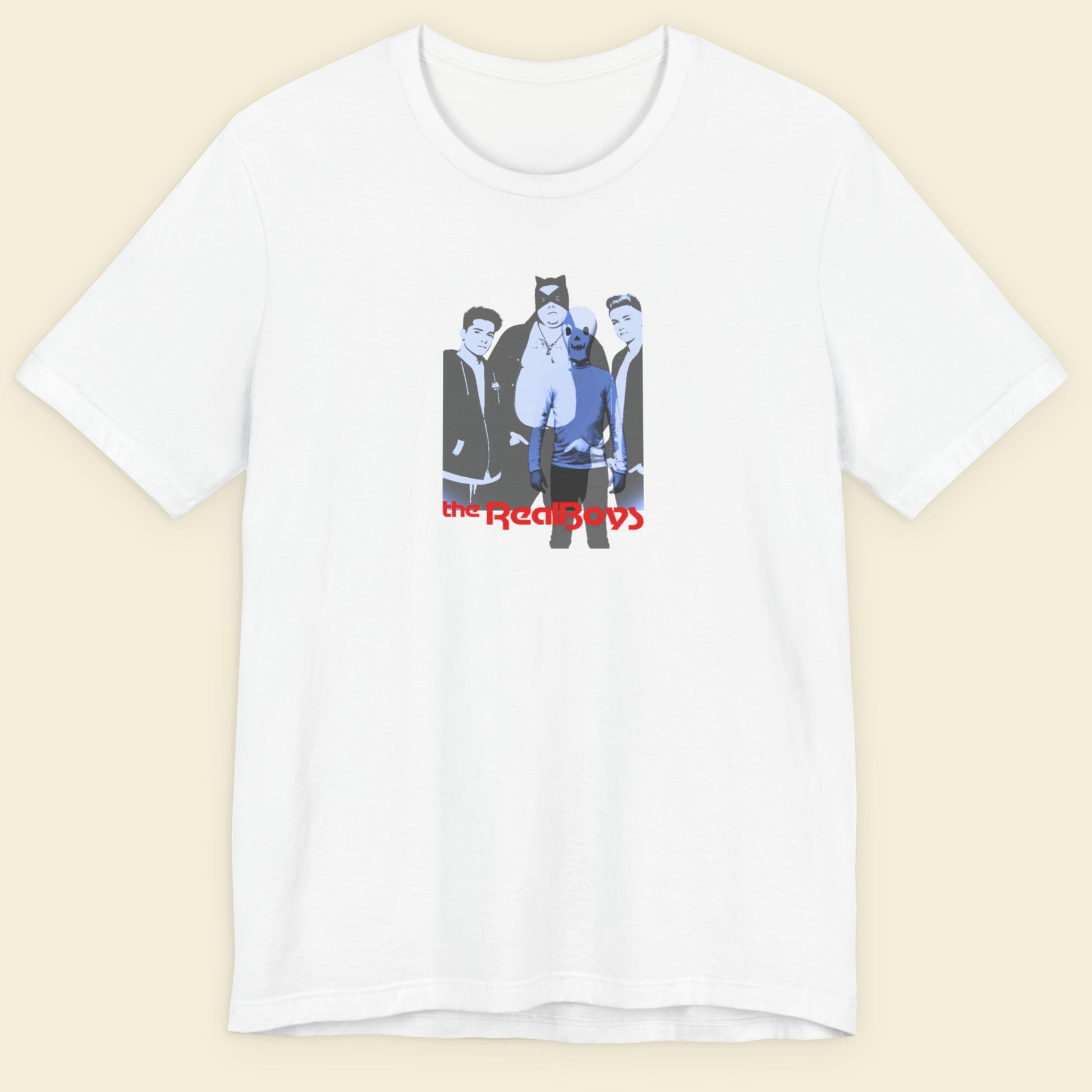 White t-shirt with graphic design and 'the RealBoys' text on a beige background.