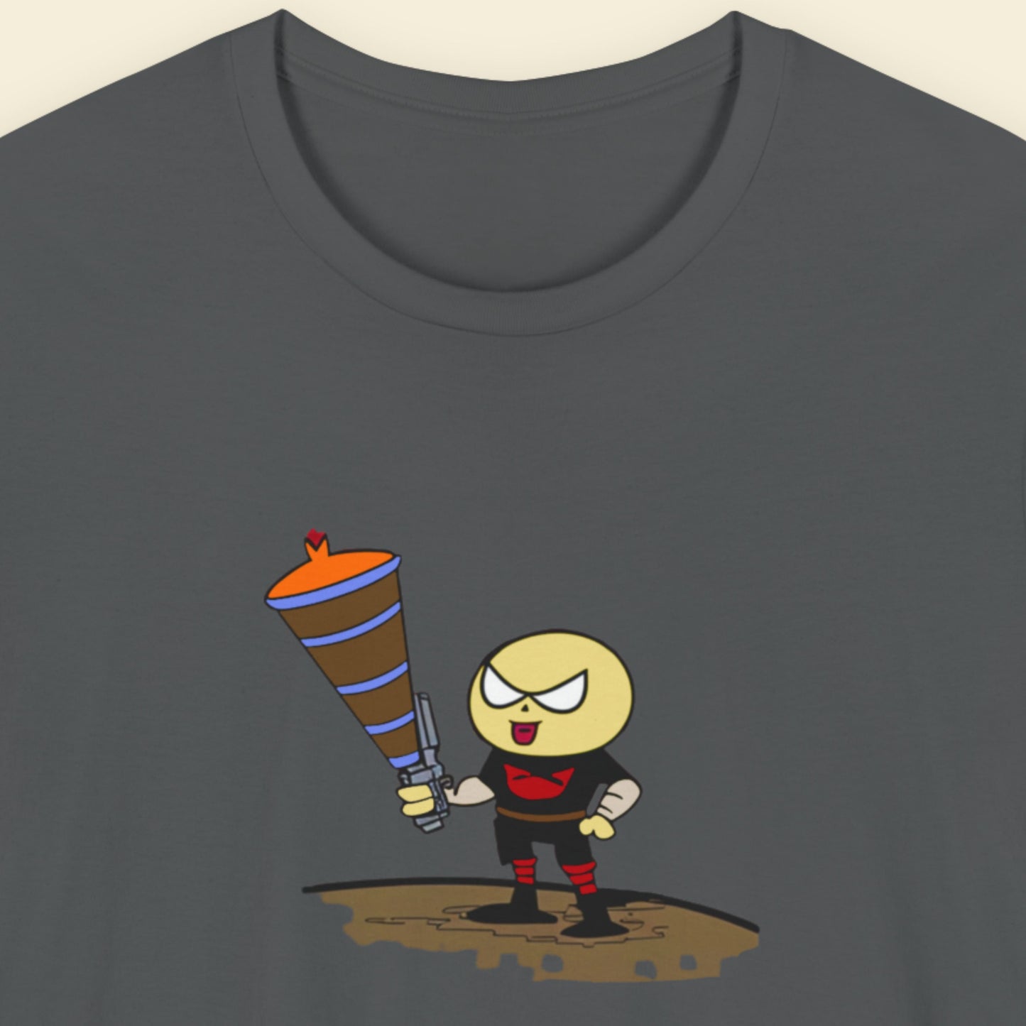Dark grey t-shirt with a fun, colorful cartoon illustration on a beige background.