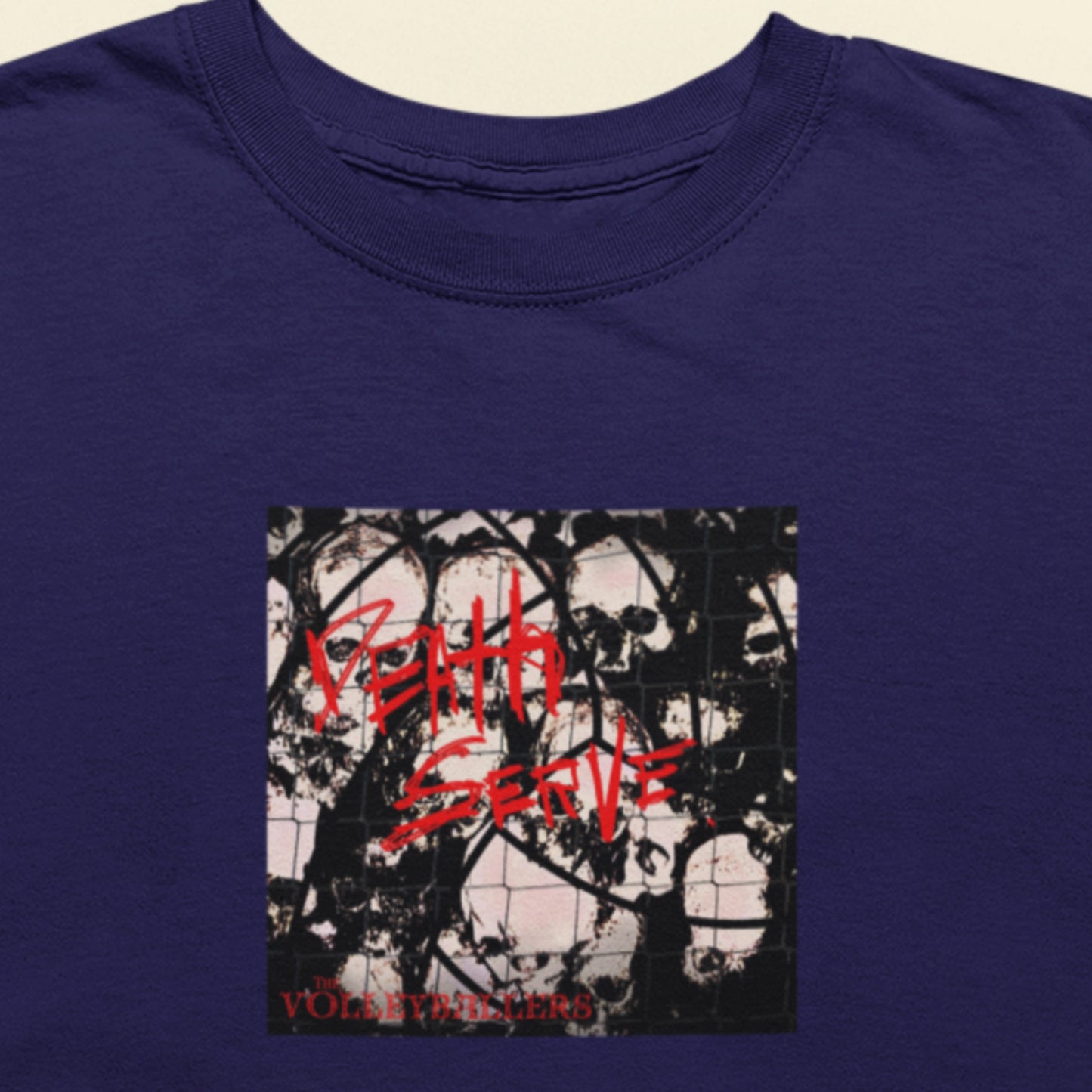 Navy blue t-shirt with an image of the Volleyballers album Death Serve
