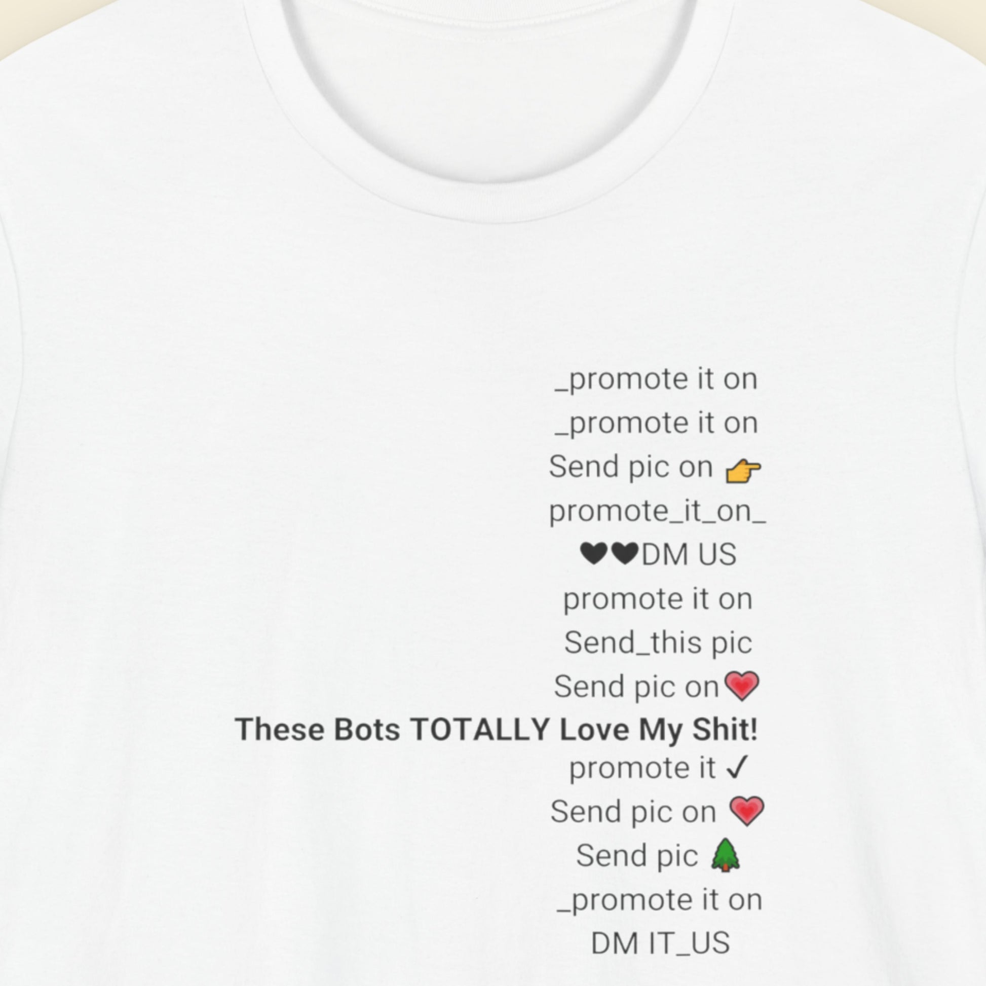 White t-shirt with text and promotional prompts on a beige background.