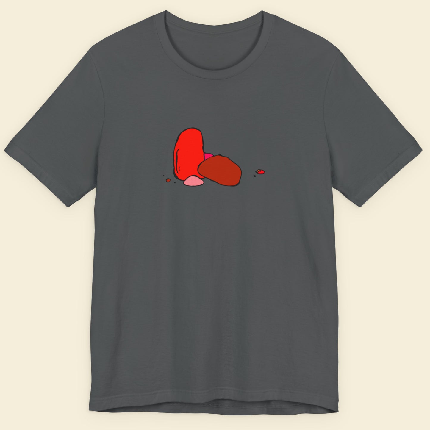 Dark grey t-shirt with a colorful drawing on a beige background.
