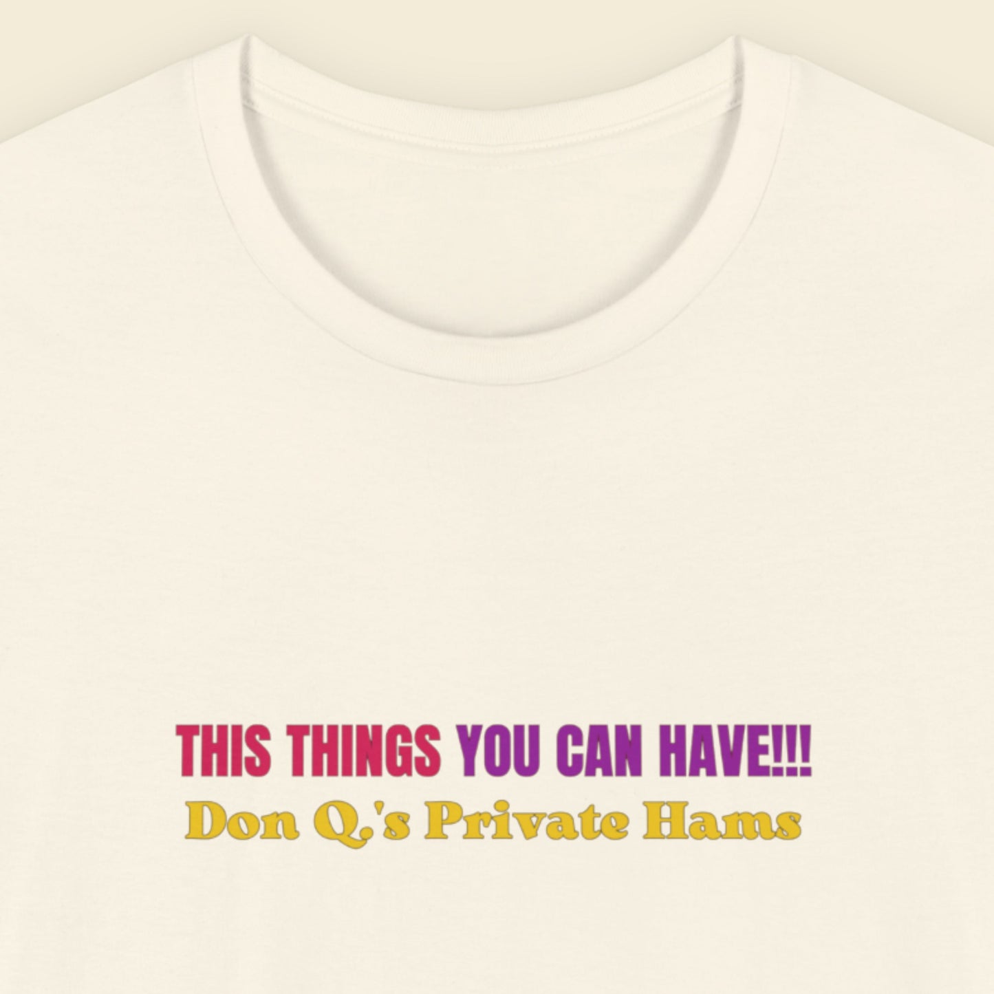 Natural cream colored shirt with multi-colored text